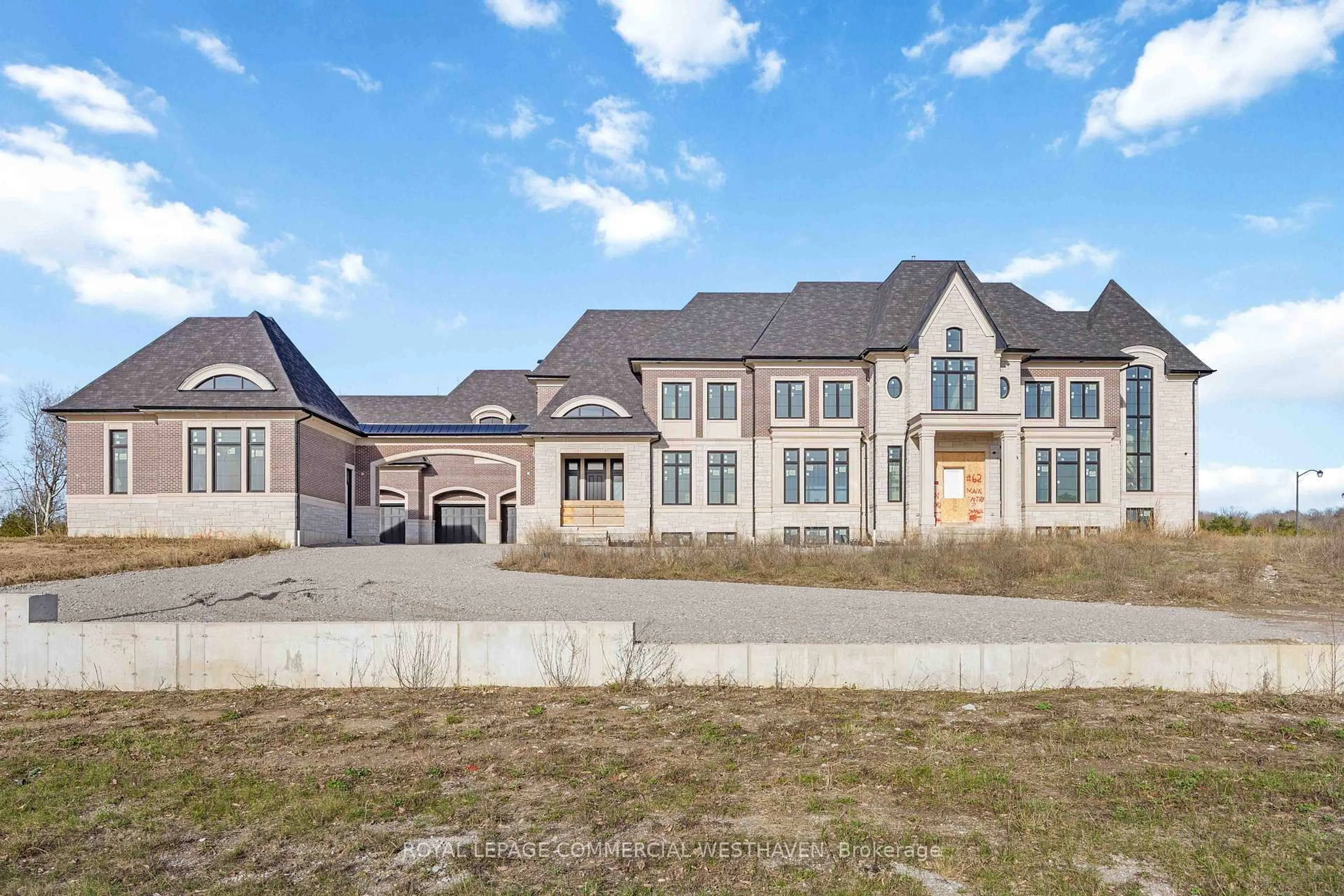 Home with brick exterior material, unknown for 62 Mount Mellick Dr, King Ontario L7B 1A3