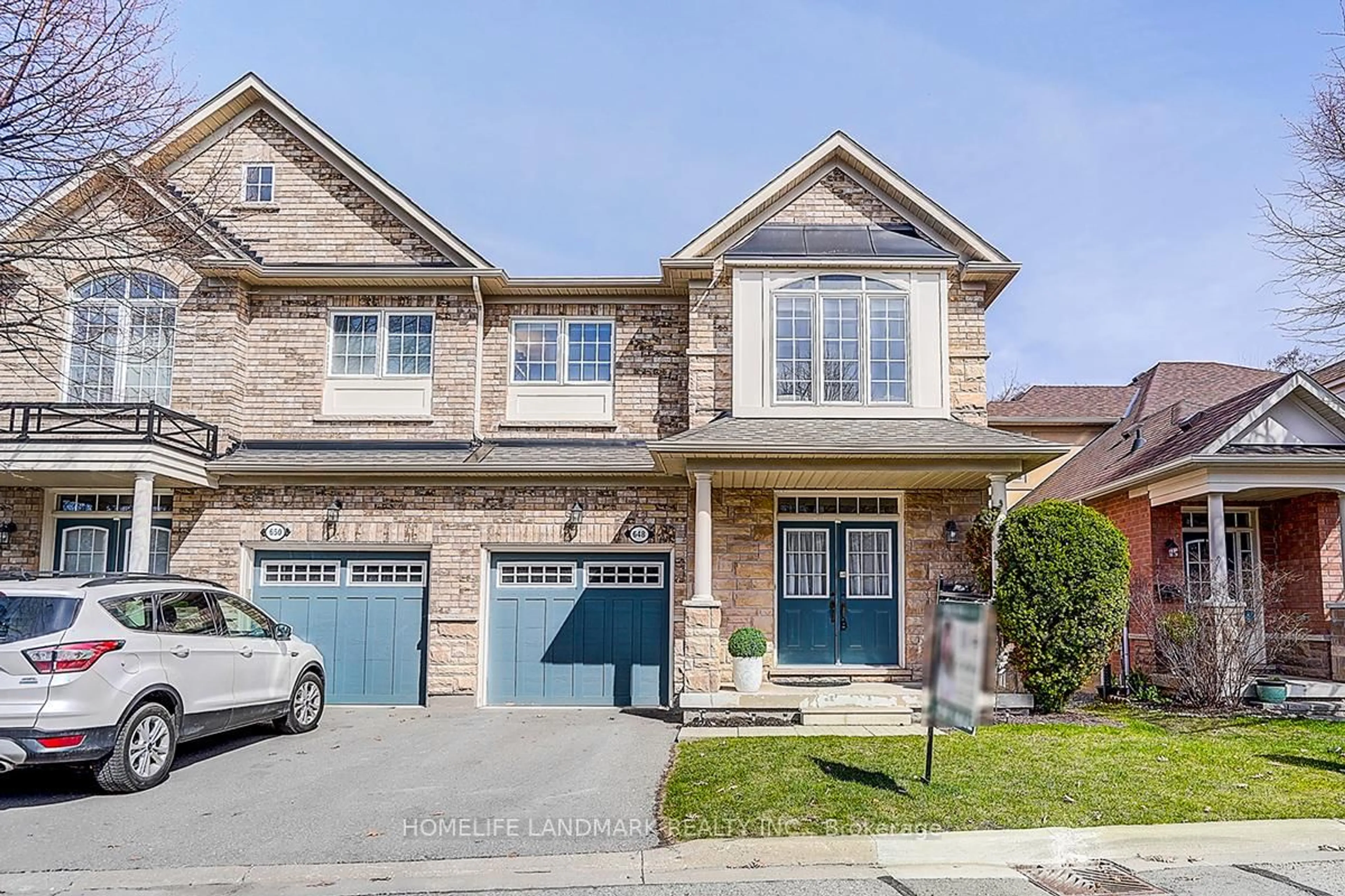 Home with brick exterior material, street for 648 Tapestry Lane, Newmarket Ontario L3X 3C8