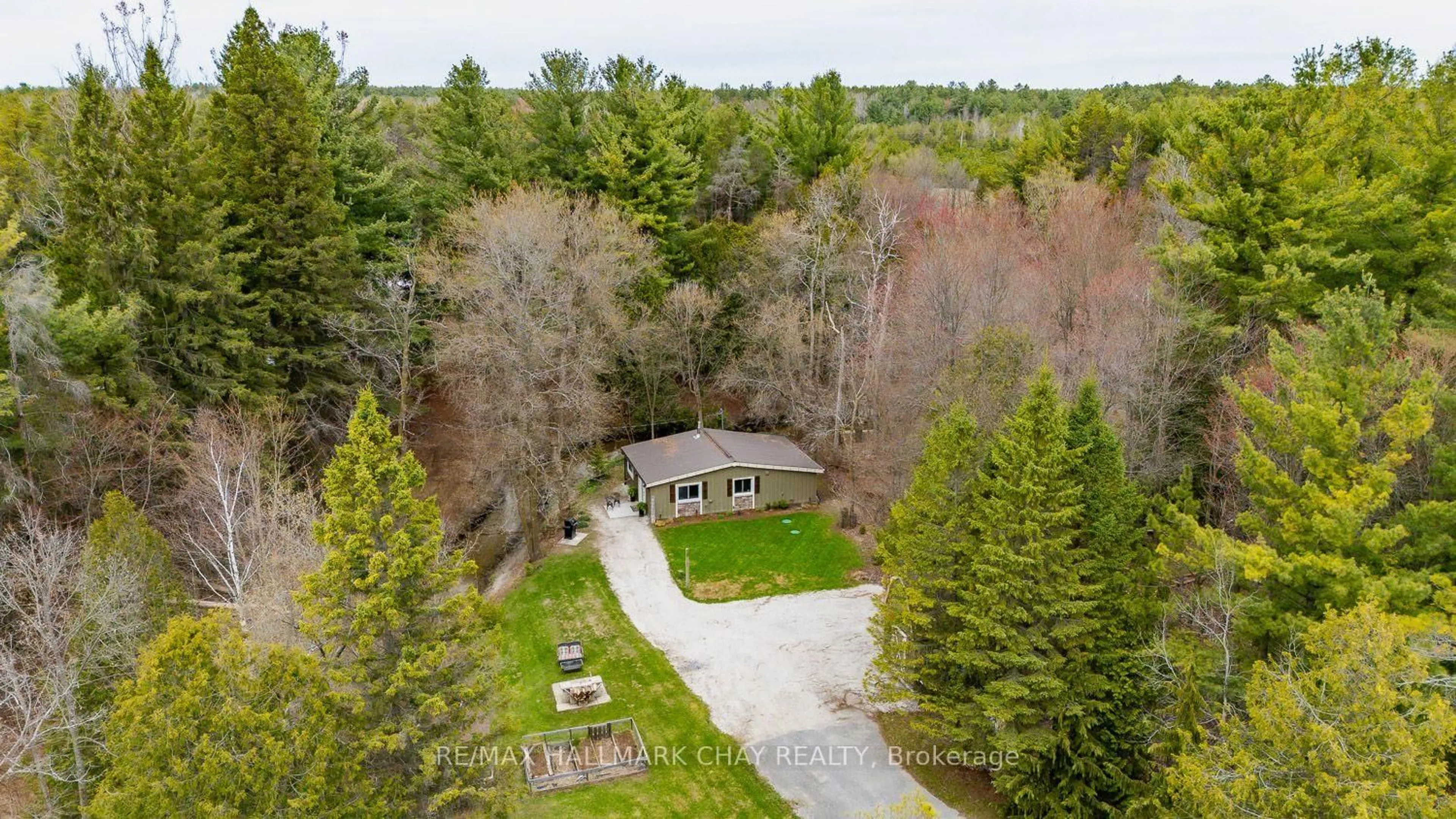 A pic from outside/outdoor area/front of a property/back of a property/a pic from drone, water/lake/river/ocean view for 8256 Main St, Adjala-Tosorontio Ontario L0M 1M0