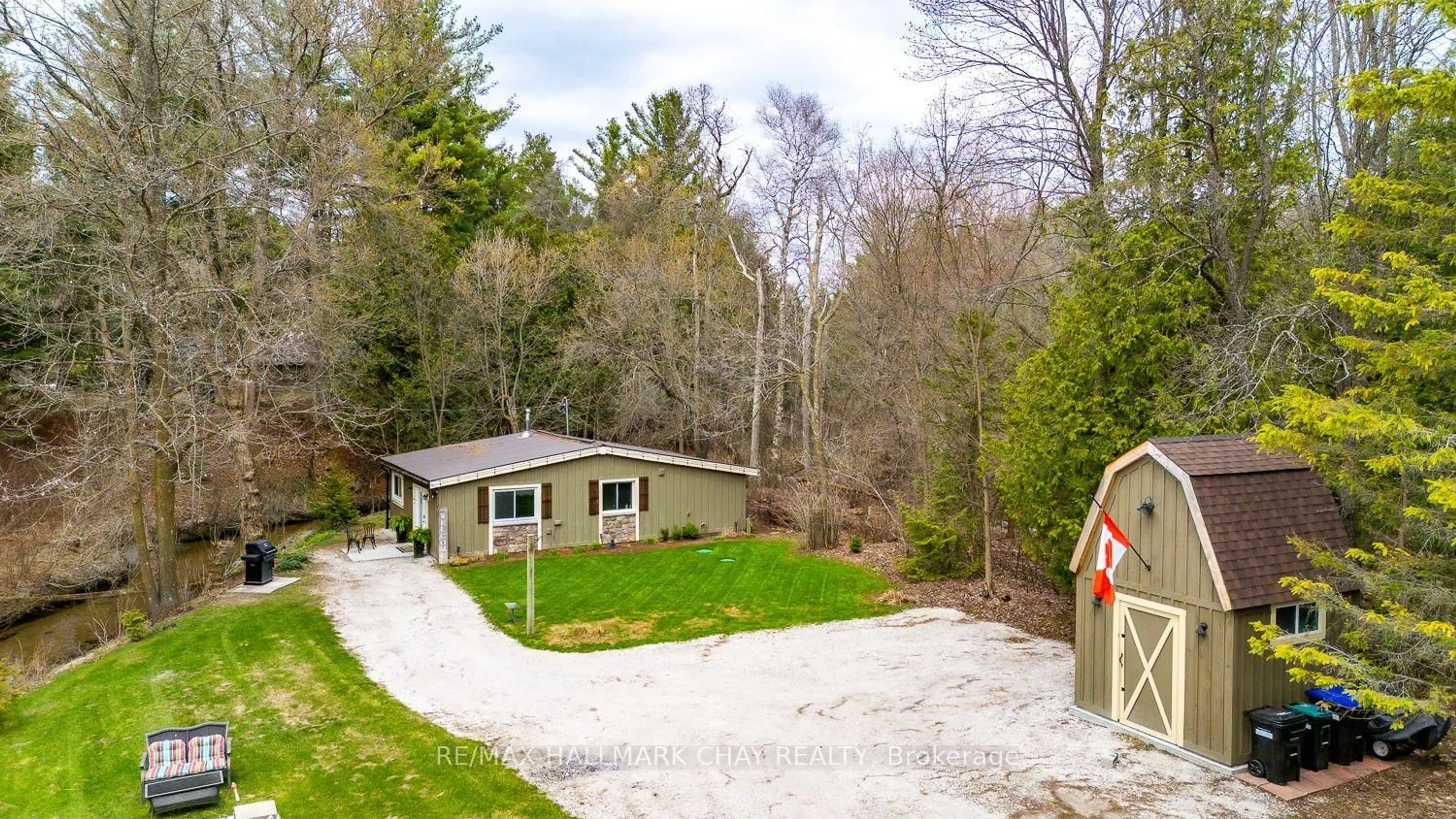 A pic from outside/outdoor area/front of a property/back of a property/a pic from drone, unknown for 8256 Main St, Adjala-Tosorontio Ontario L0M 1M0