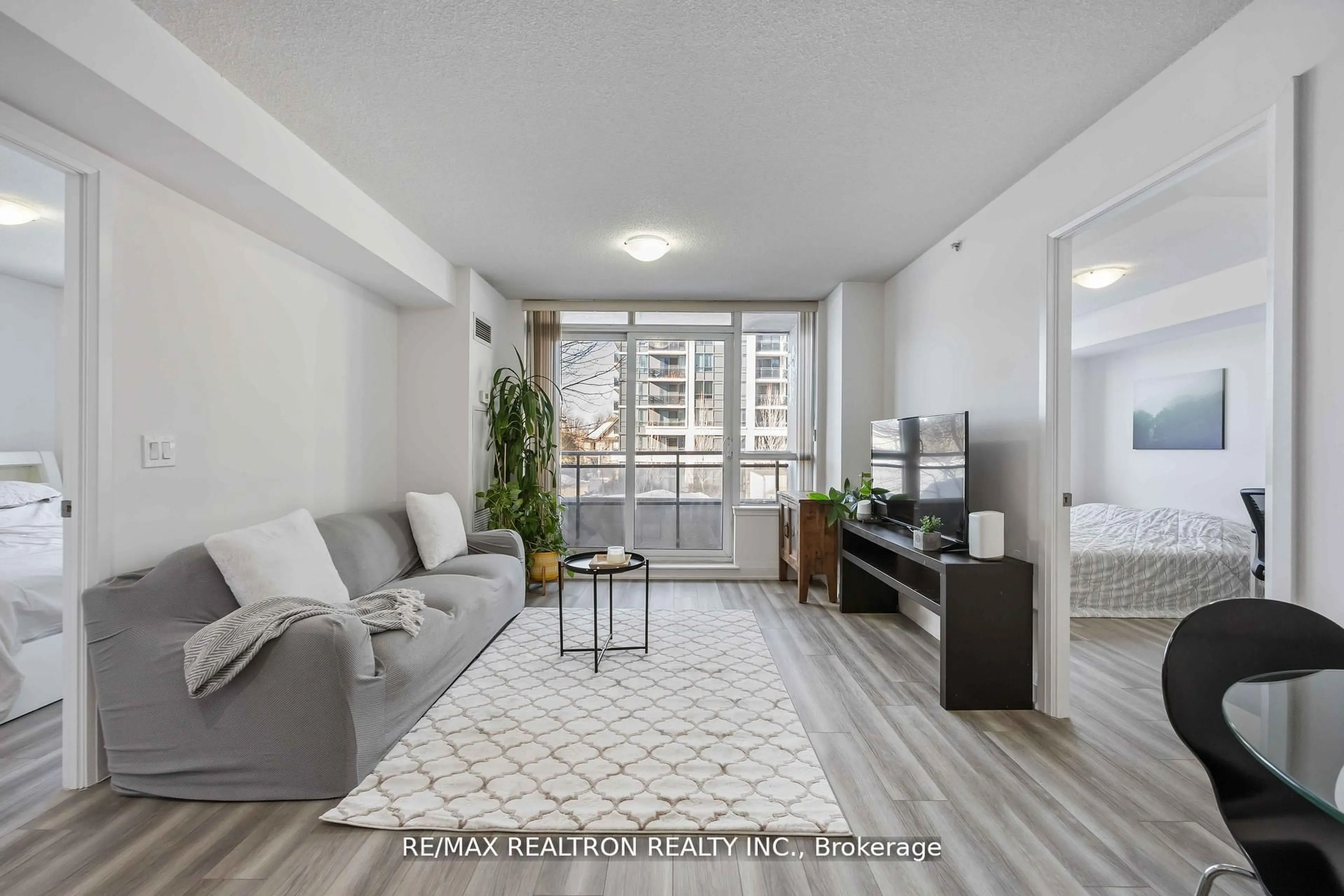 Living room with furniture, unknown for 372 Highway 7 Rd #212, Richmond Hill Ontario L4B 0C6