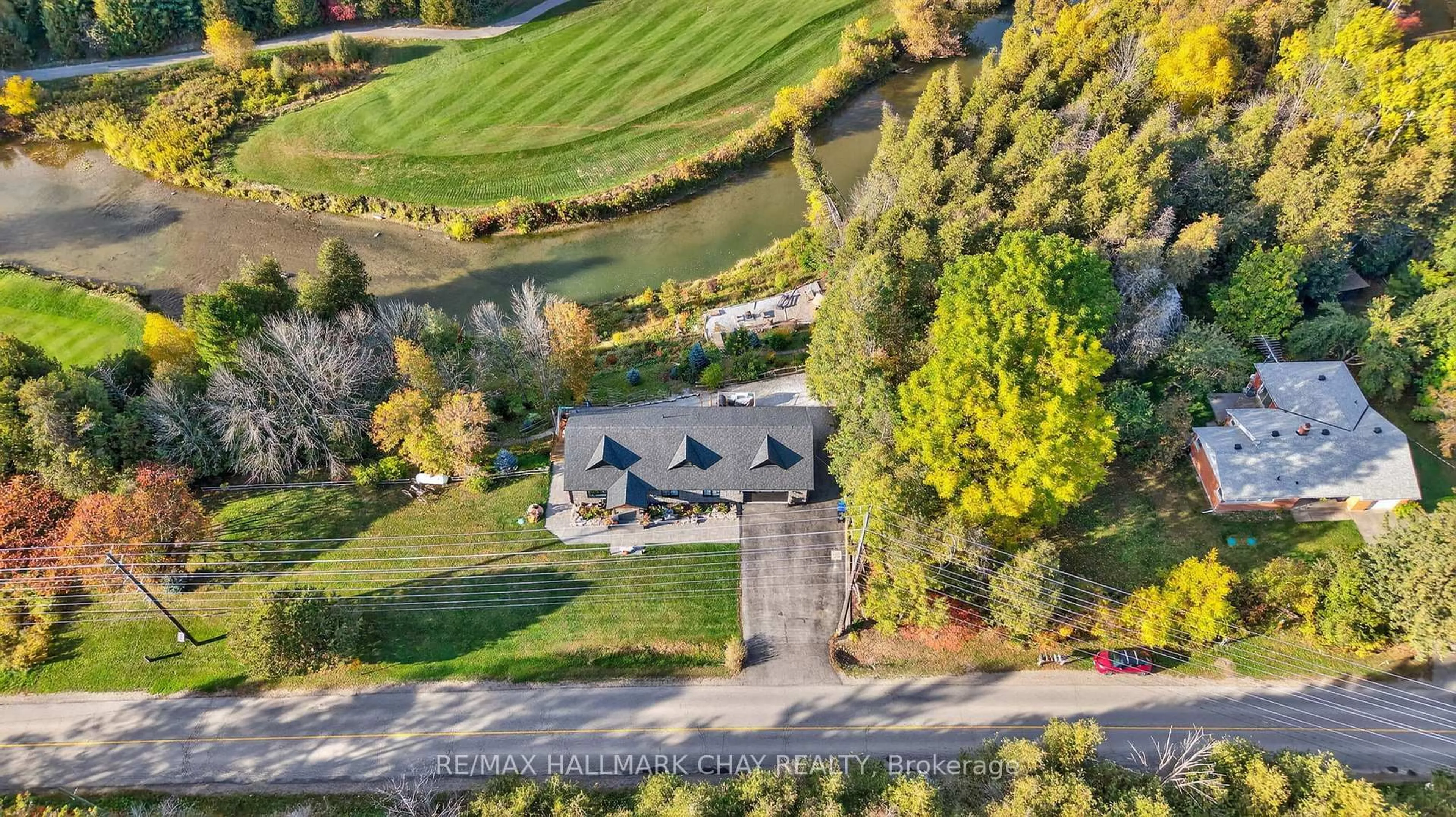 A pic from outside/outdoor area/front of a property/back of a property/a pic from drone, water/lake/river/ocean view for 6172 14th Line, New Tecumseth Ontario L9R 1N4