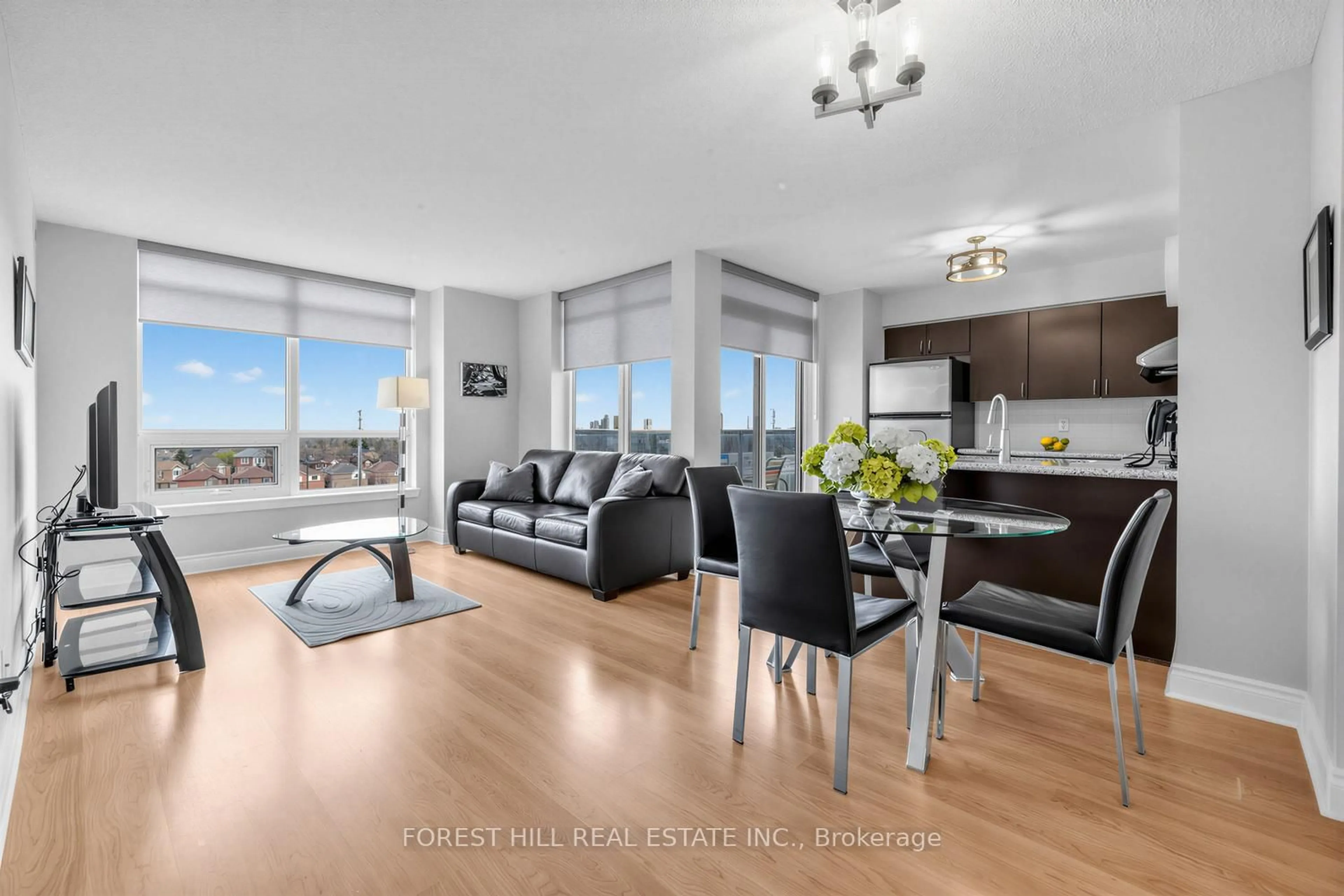 Living room with furniture, wood/laminate floor for 7 North Park Rd #511, Vaughan Ontario L4J 0C9