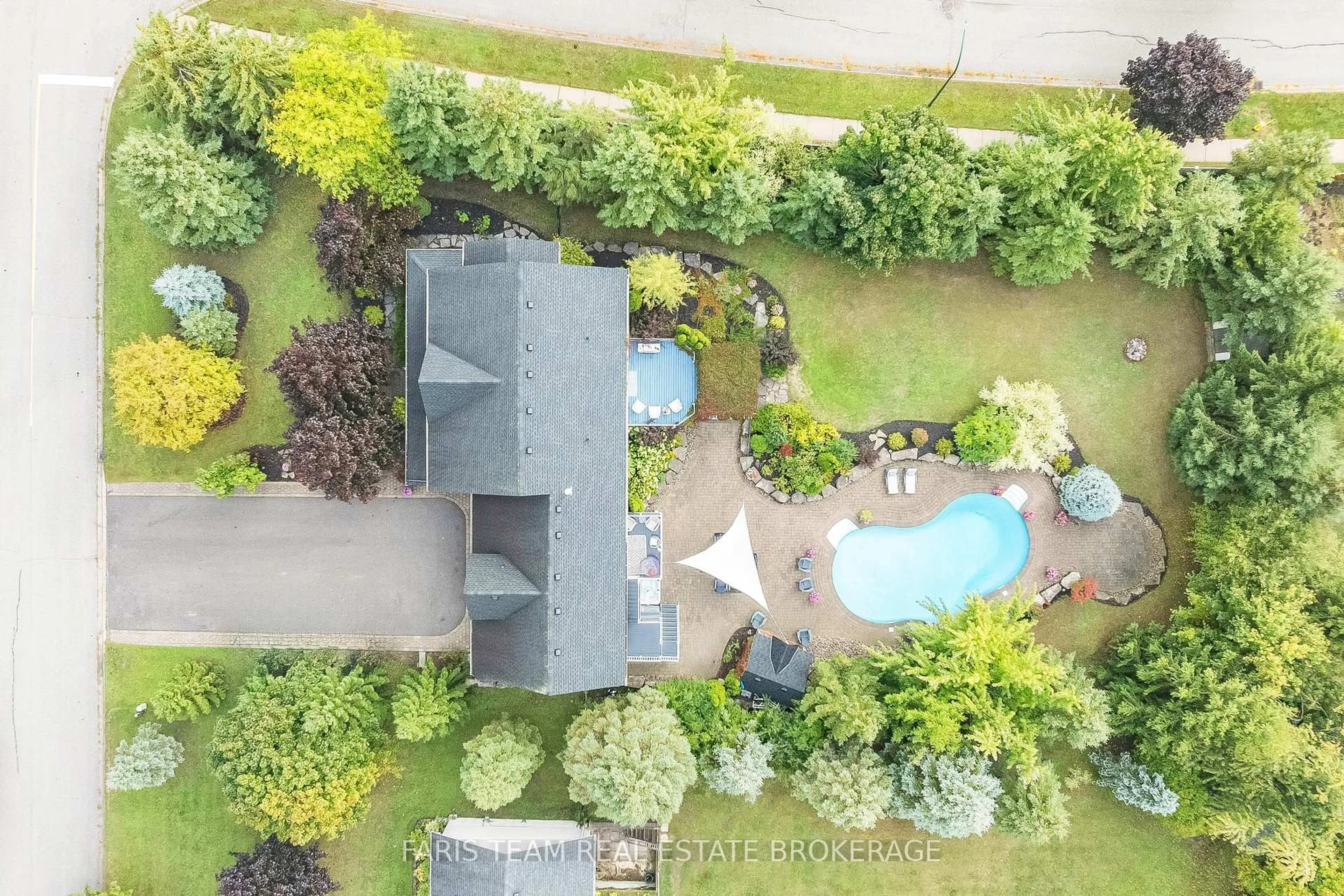 A pic from outside/outdoor area/front of a property/back of a property/a pic from drone, unknown for 2 Evergreen Lane, Essa Ontario L0L 2N0