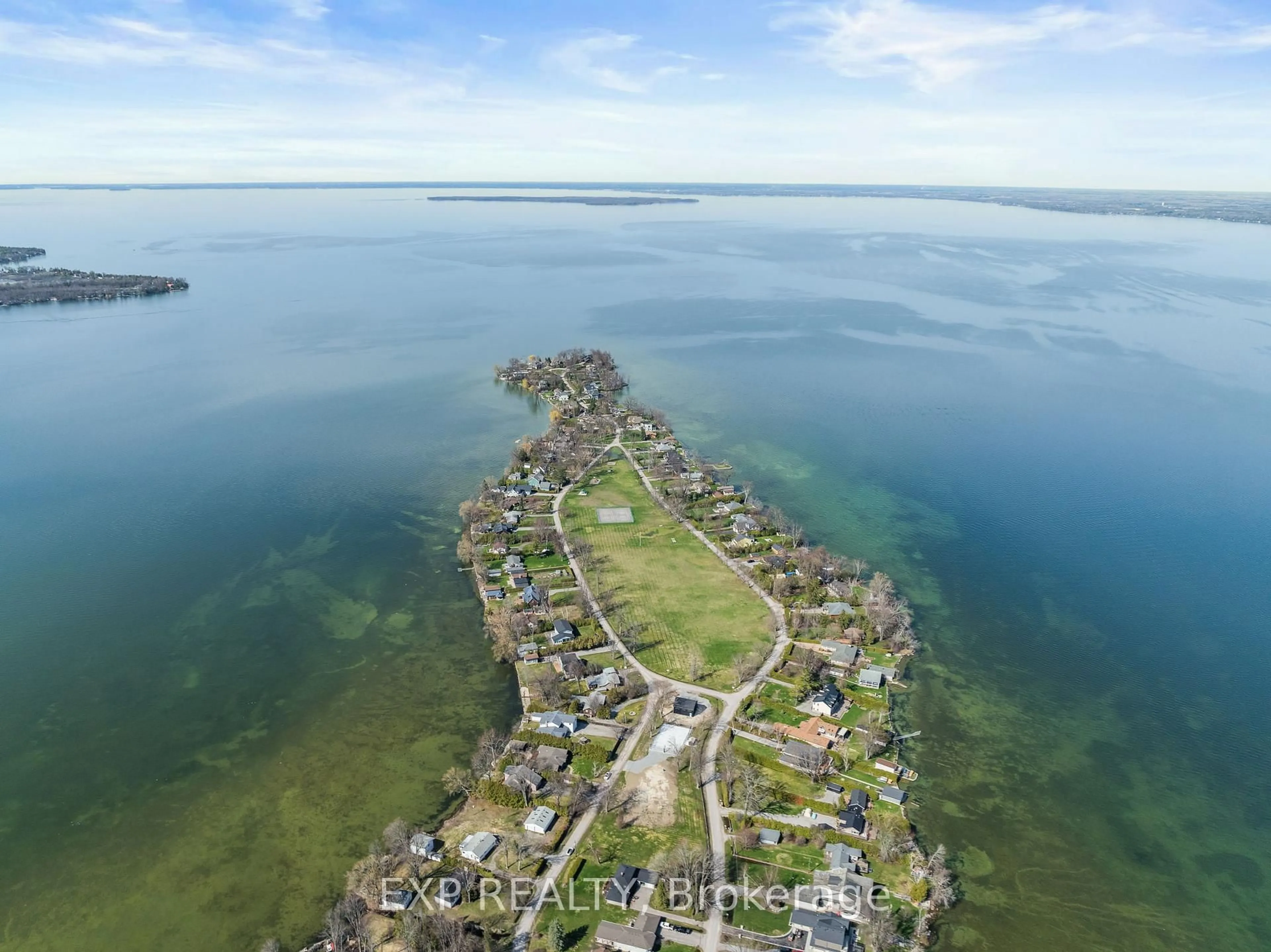 A pic from outside/outdoor area/front of a property/back of a property/a pic from drone, water/lake/river/ocean view for 582 Duclos Point Rd, Georgina Ontario L0E 1N0
