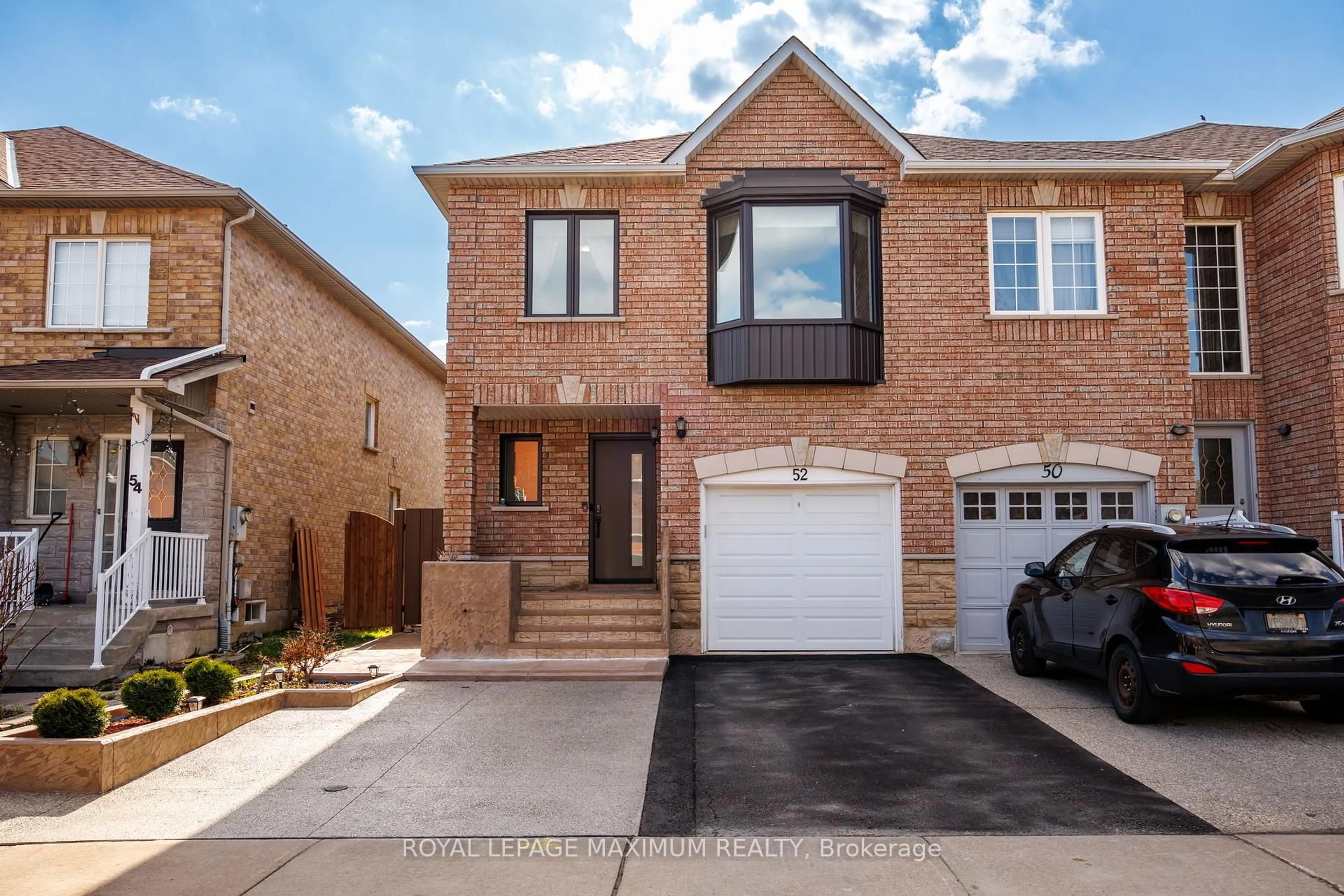 Home with brick exterior material, street for 52 Pottery Pl, Vaughan Ontario L4L 9H6