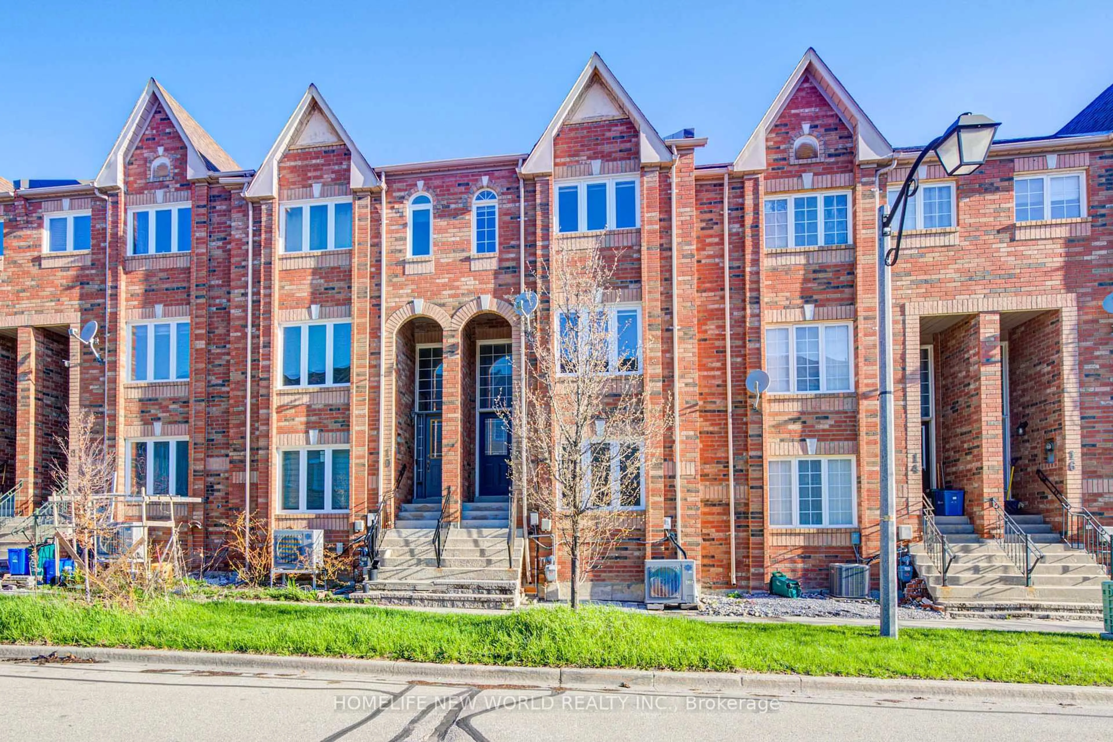 Home with brick exterior material, street for 12 Azalea Gateway, Markham Ontario L3T 7T8