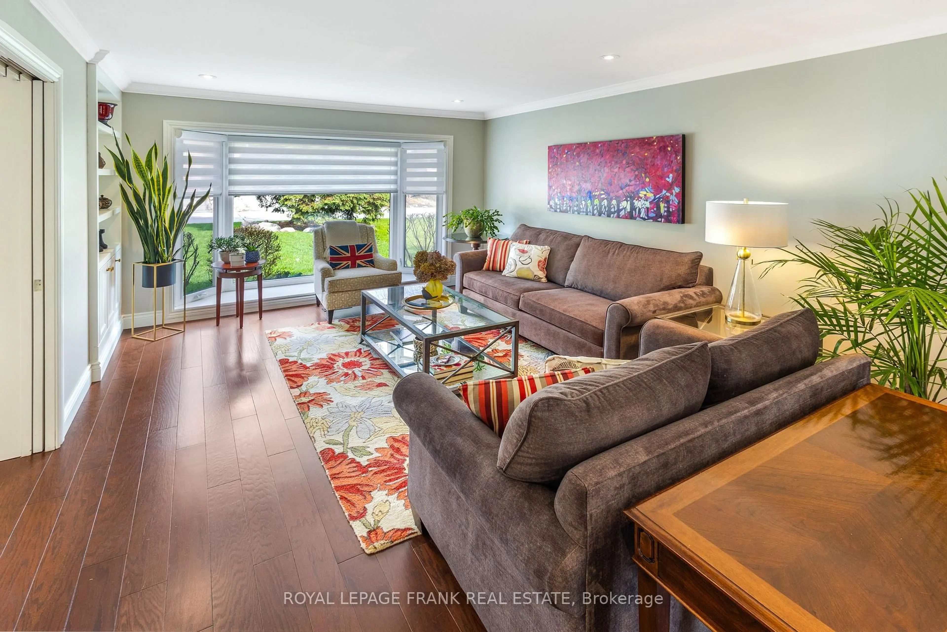 Living room with furniture, wood/laminate floor for 68 Burling Pl, Newmarket Ontario L3Y 5W4