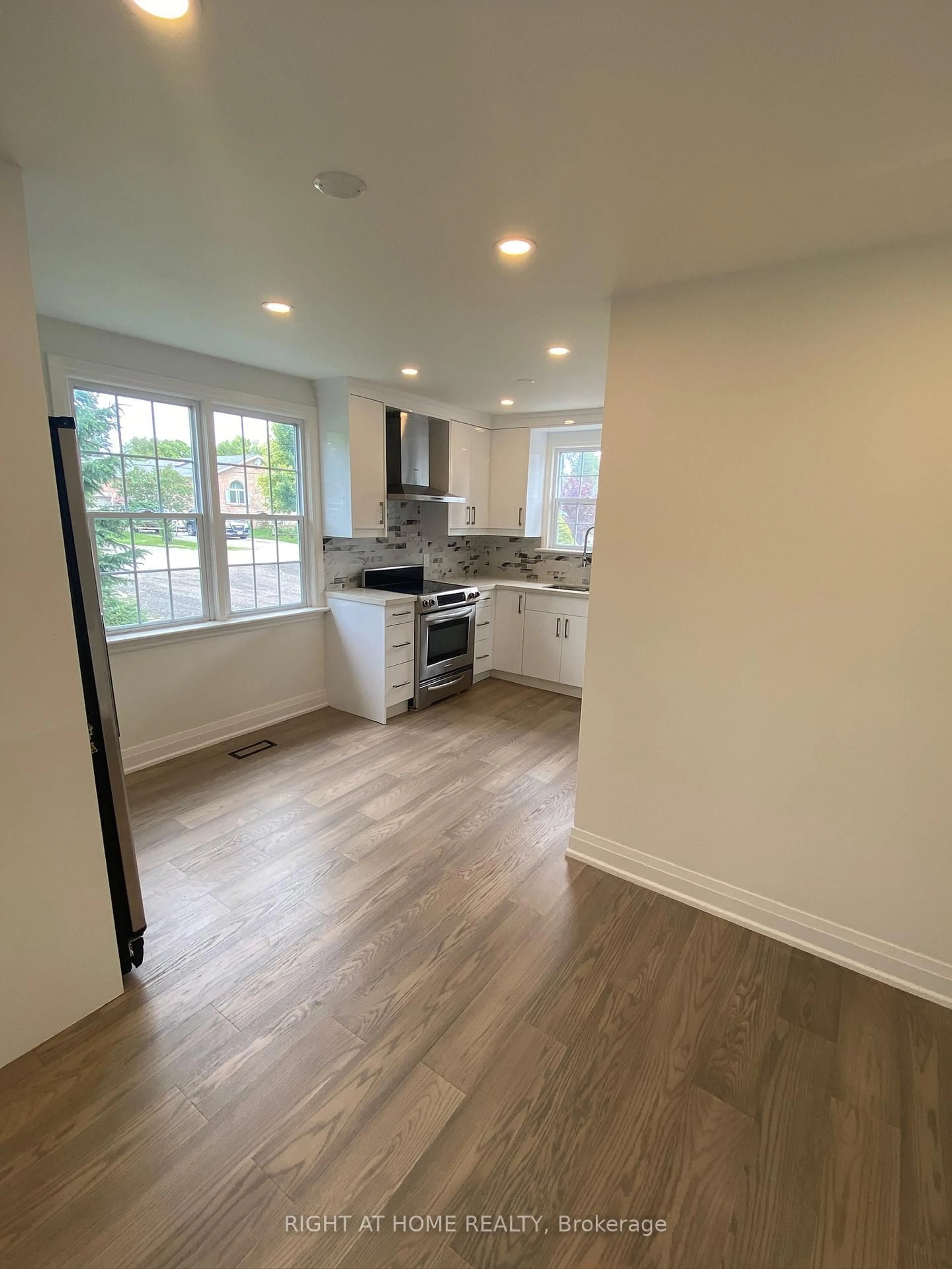 Open concept kitchen, wood/laminate floor for 267 Rayners Rd, Georgina Ontario L4P 1G5