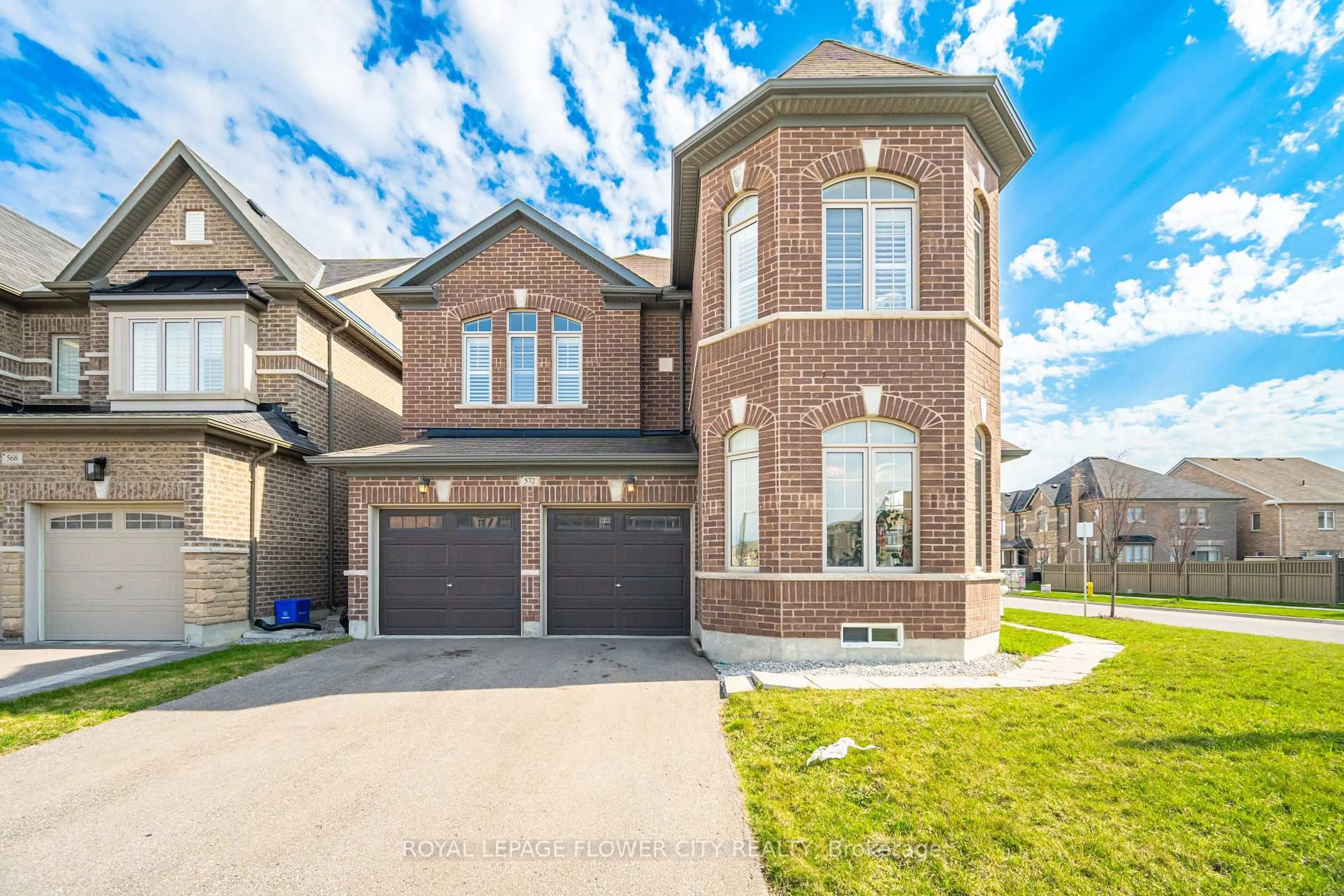 Home with brick exterior material, street for 572 Mactier Dr, Vaughan Ontario L4H 4T9