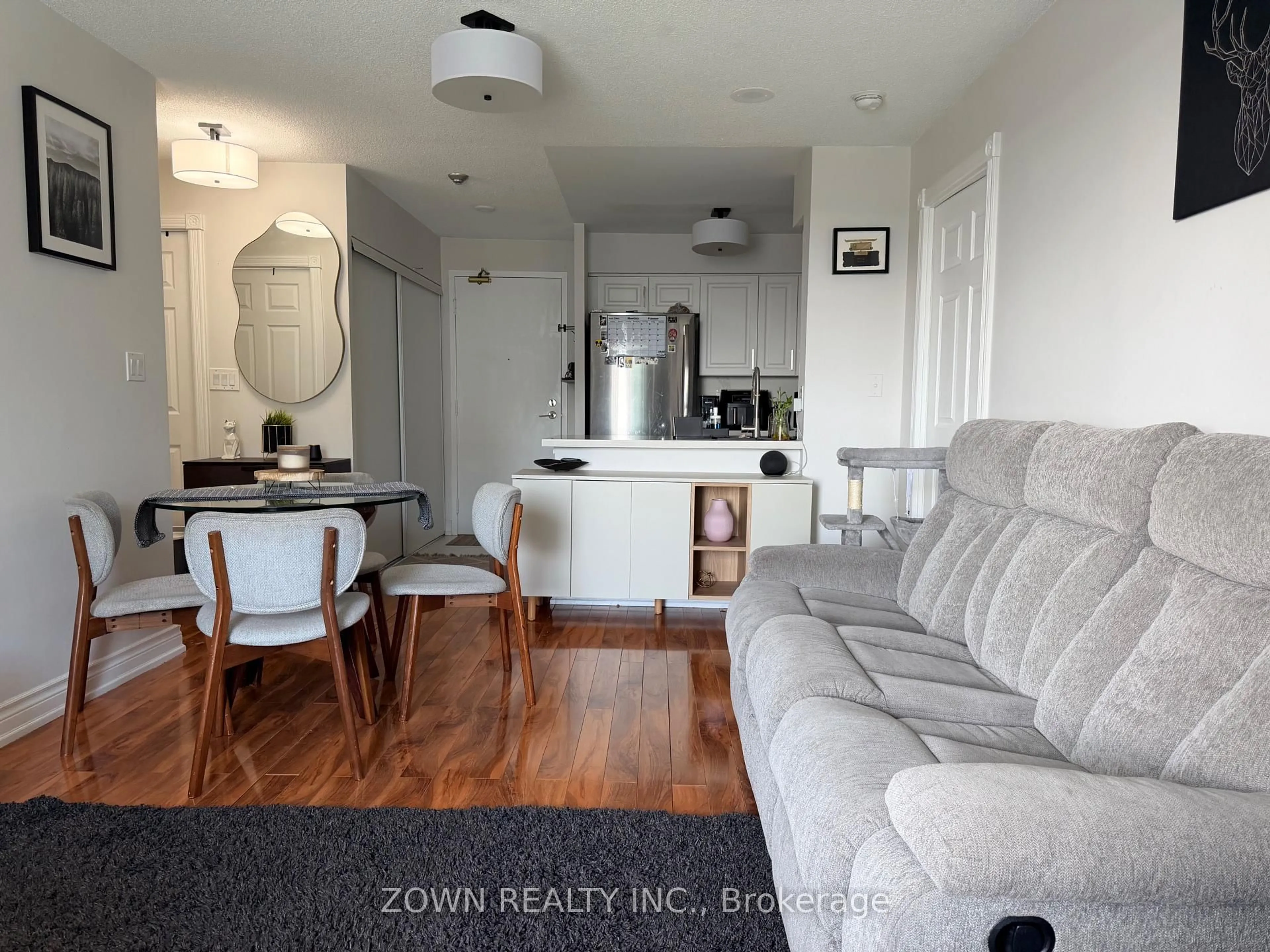 Living room with furniture, wood/laminate floor for 3 Ellesmere St #611, Richmond Hill Ontario L4B 4N2