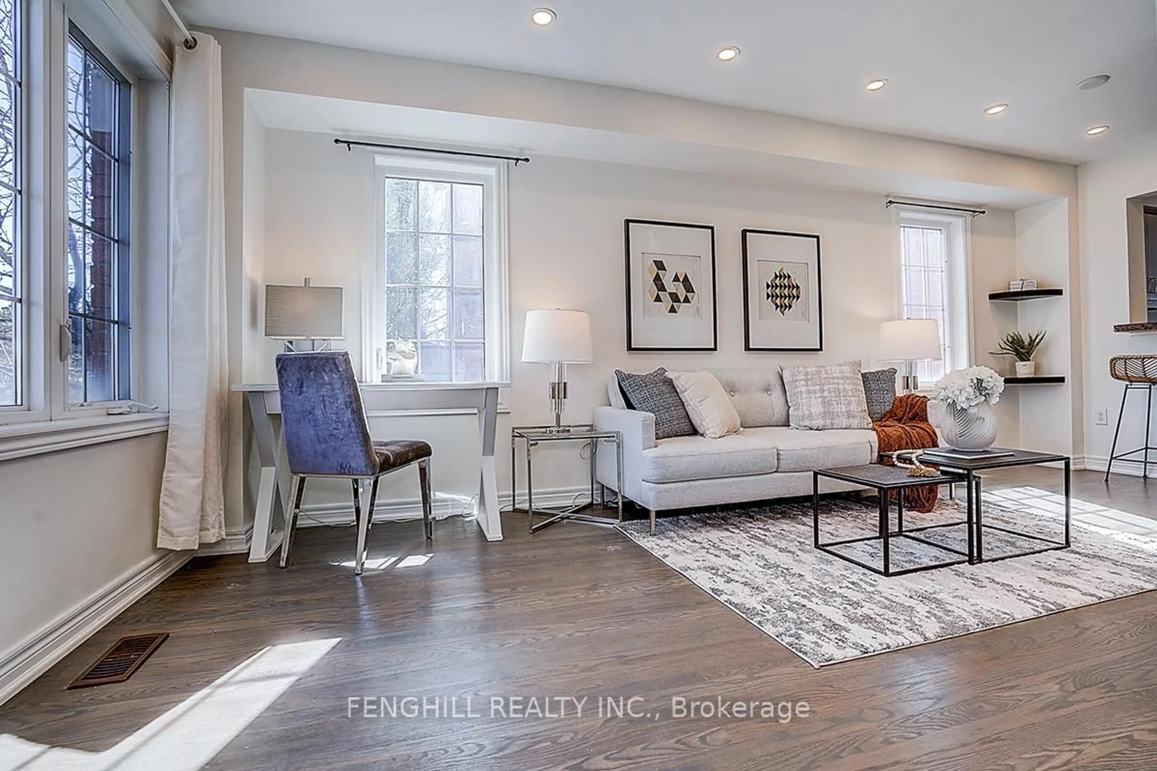 Living room with furniture, wood/laminate floor for 375 White's Hill Ave, Markham Ontario L6B 0J3