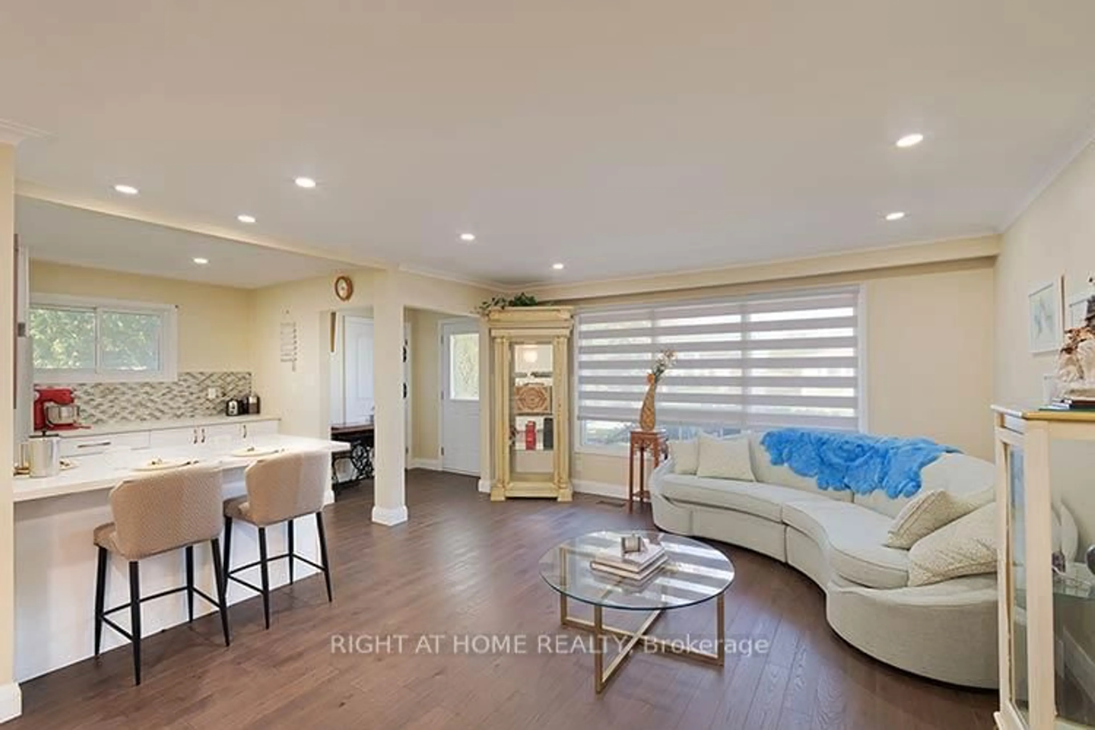 Living room with furniture, wood/laminate floor for 304 Roywood Cres, Newmarket Ontario L4Y 1A5