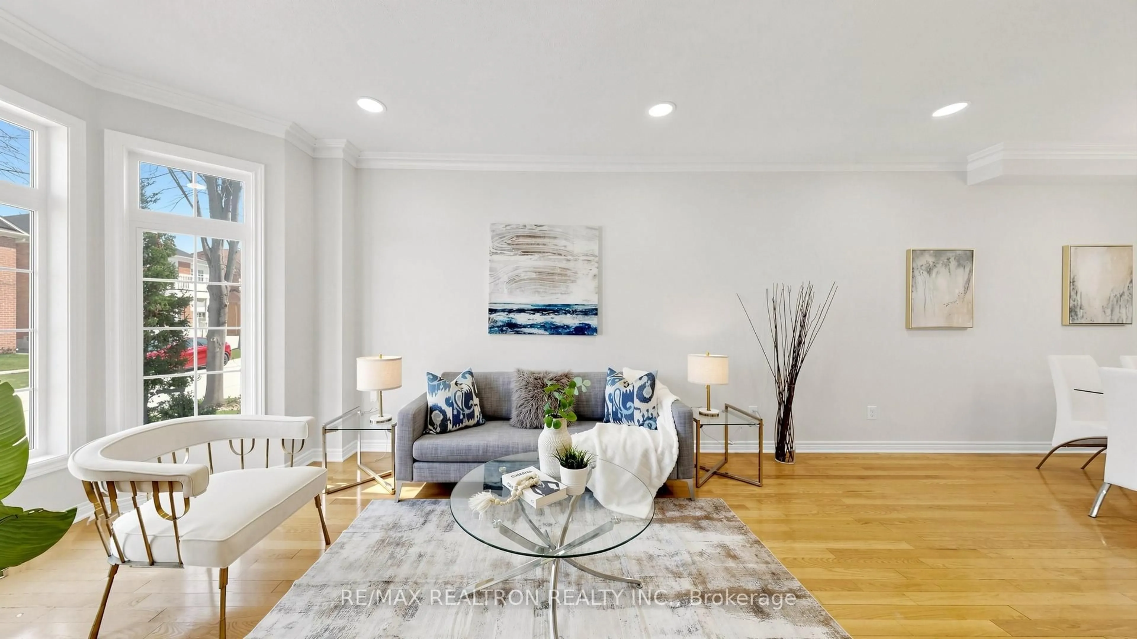 Living room with furniture, wood/laminate floor for 46 Gardenia Cres, Markham Ontario L6C 2K8