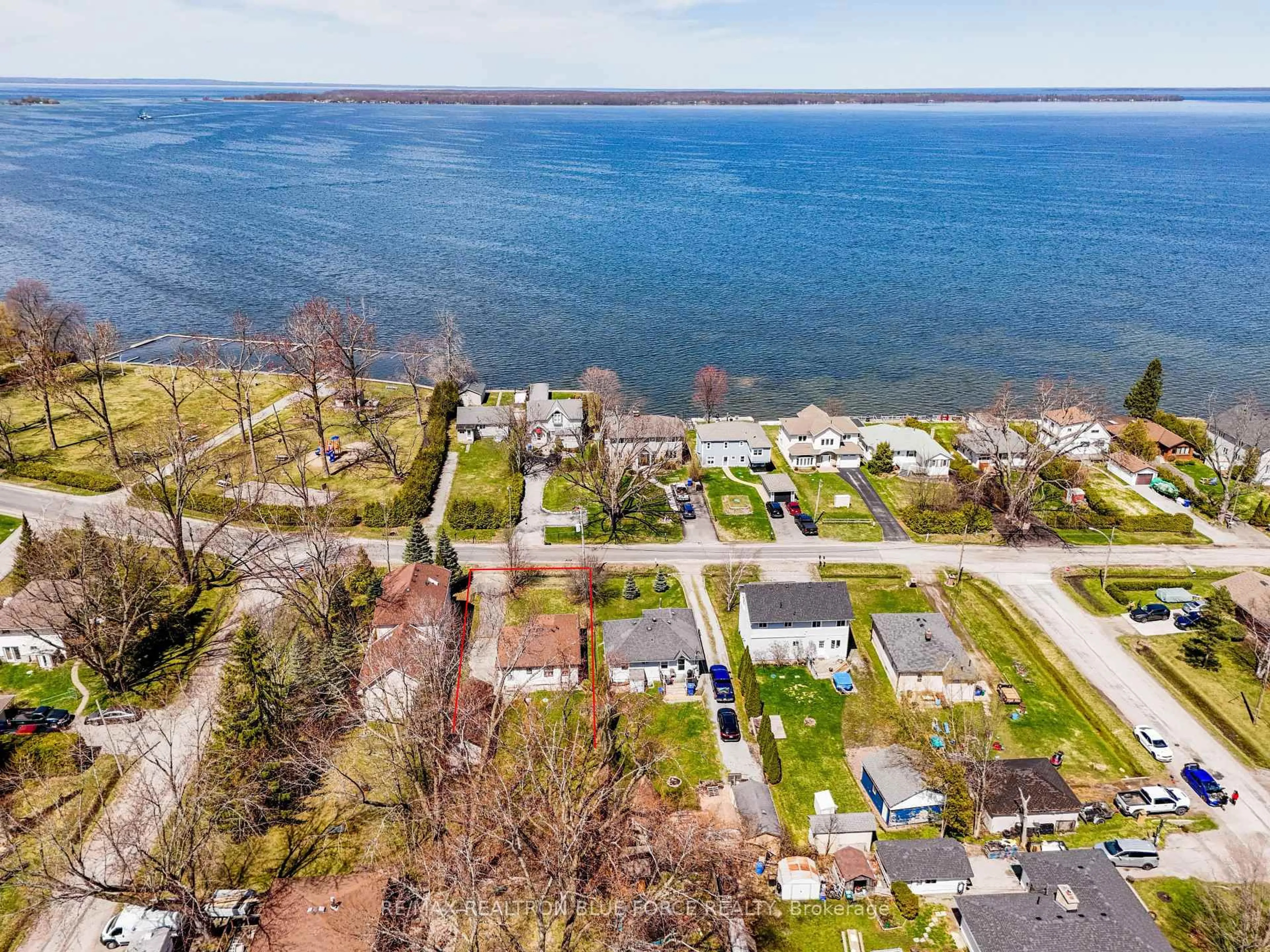 A pic from outside/outdoor area/front of a property/back of a property/a pic from drone, water/lake/river/ocean view for 57 Lakeshore Rd, Georgina Ontario L0E 1N0