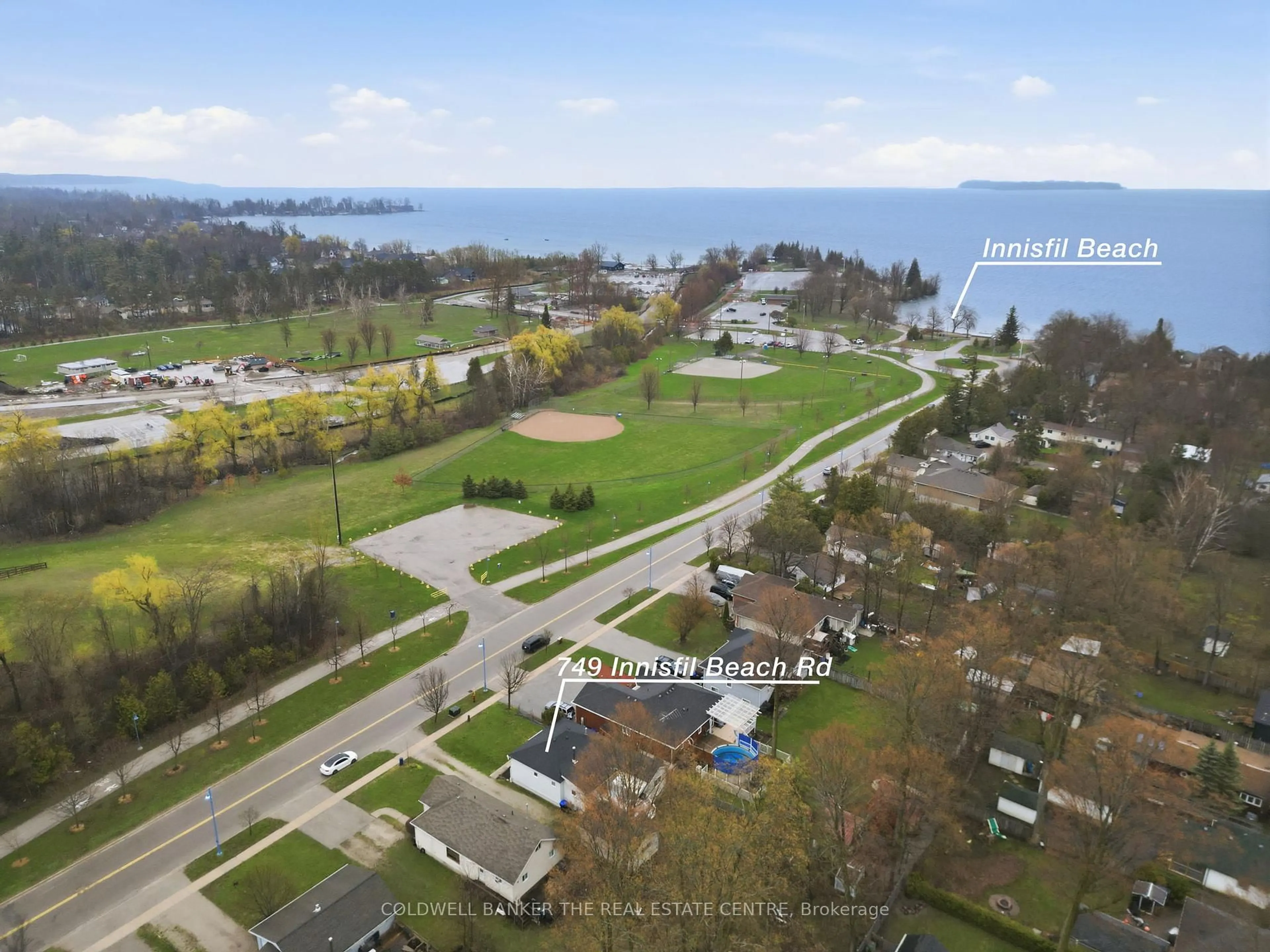 A pic from outside/outdoor area/front of a property/back of a property/a pic from drone, water/lake/river/ocean view for 749 Innisfil Beach Rd, Innisfil Ontario L9S 4E4