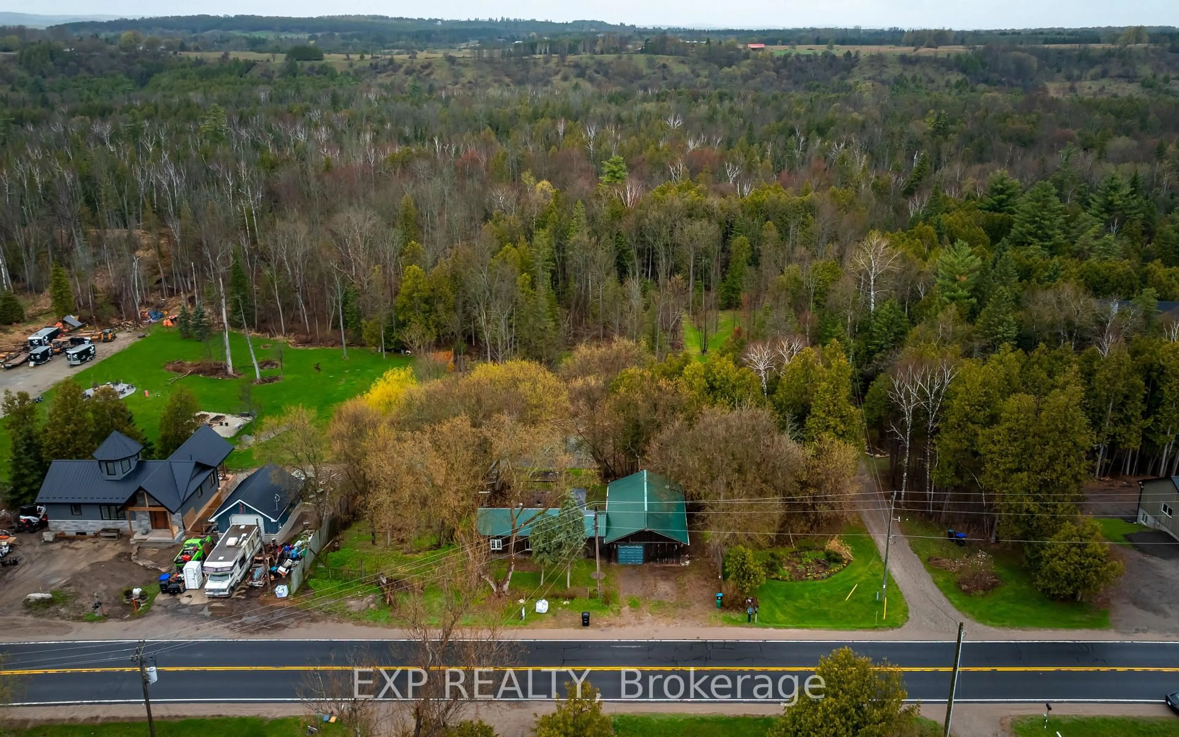A pic from outside/outdoor area/front of a property/back of a property/a pic from drone, forest/trees view for 9254 County 1, Adjala-Tosorontio Ontario L0N 1P0