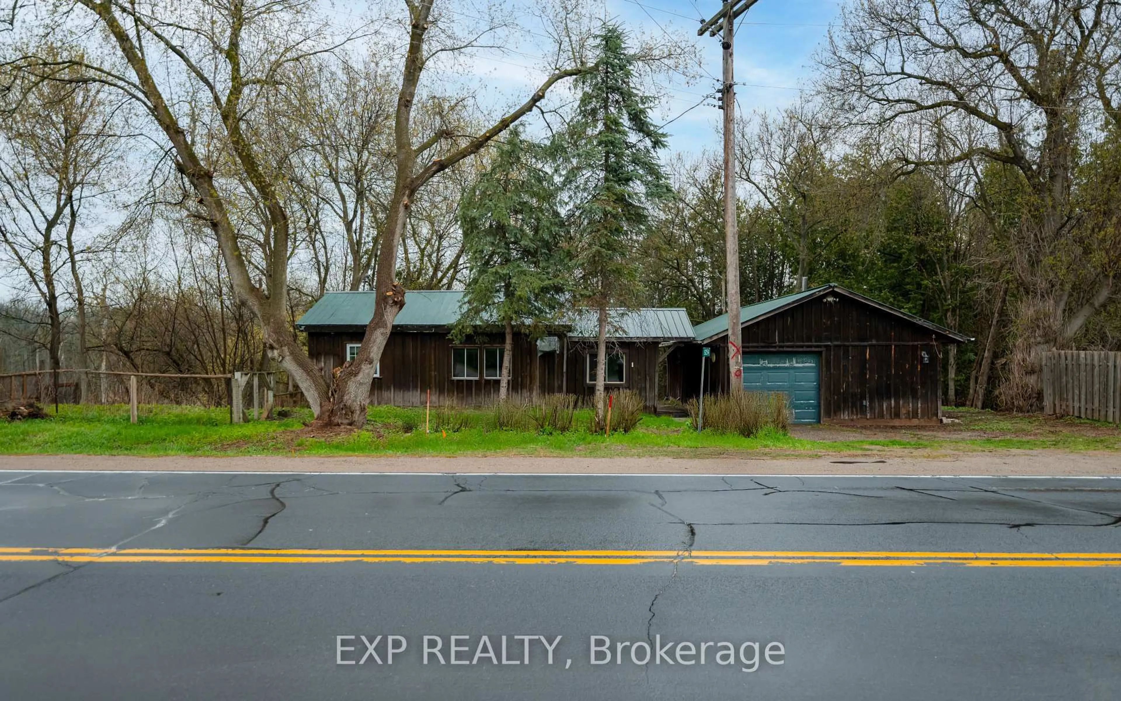 A pic from outside/outdoor area/front of a property/back of a property/a pic from drone, street for 9254 County 1, Adjala-Tosorontio Ontario L0N 1P0