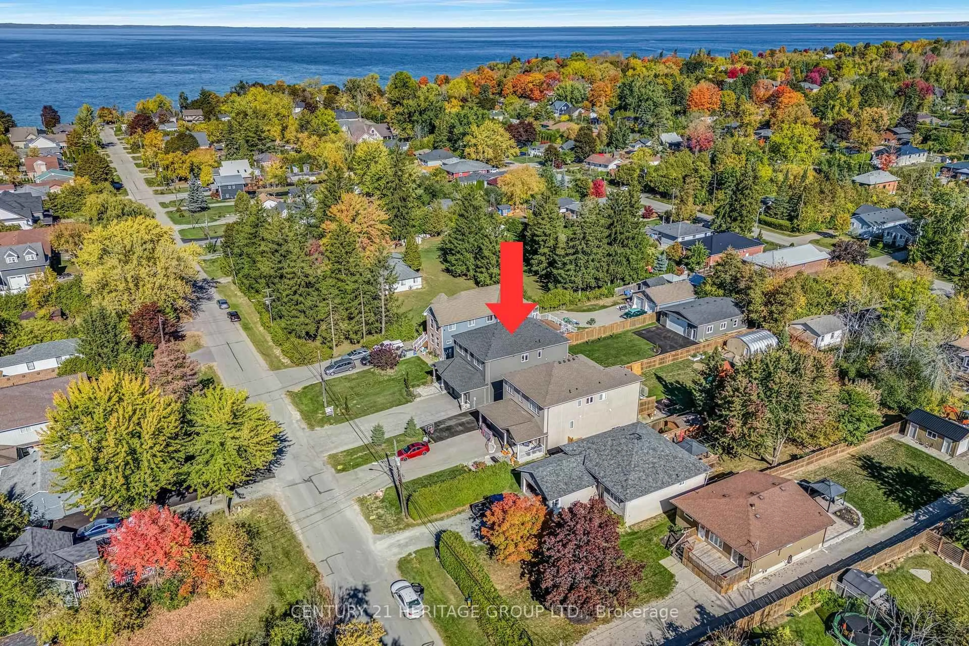 A pic from outside/outdoor area/front of a property/back of a property/a pic from drone, water/lake/river/ocean view for 807A Montsell Ave, Georgina Ontario L0E 1S0