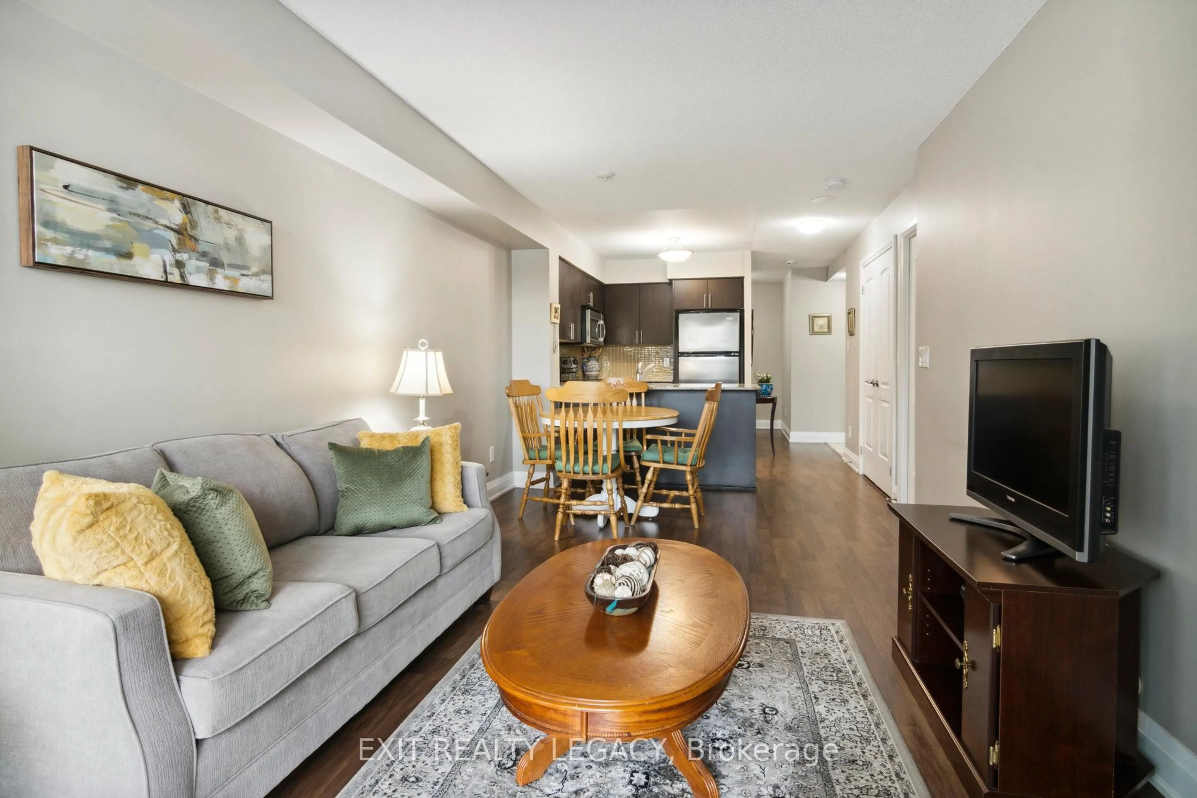 Living room with furniture, wood/laminate floor for 20 North Park Rd #206, Vaughan Ontario L4J 0G7
