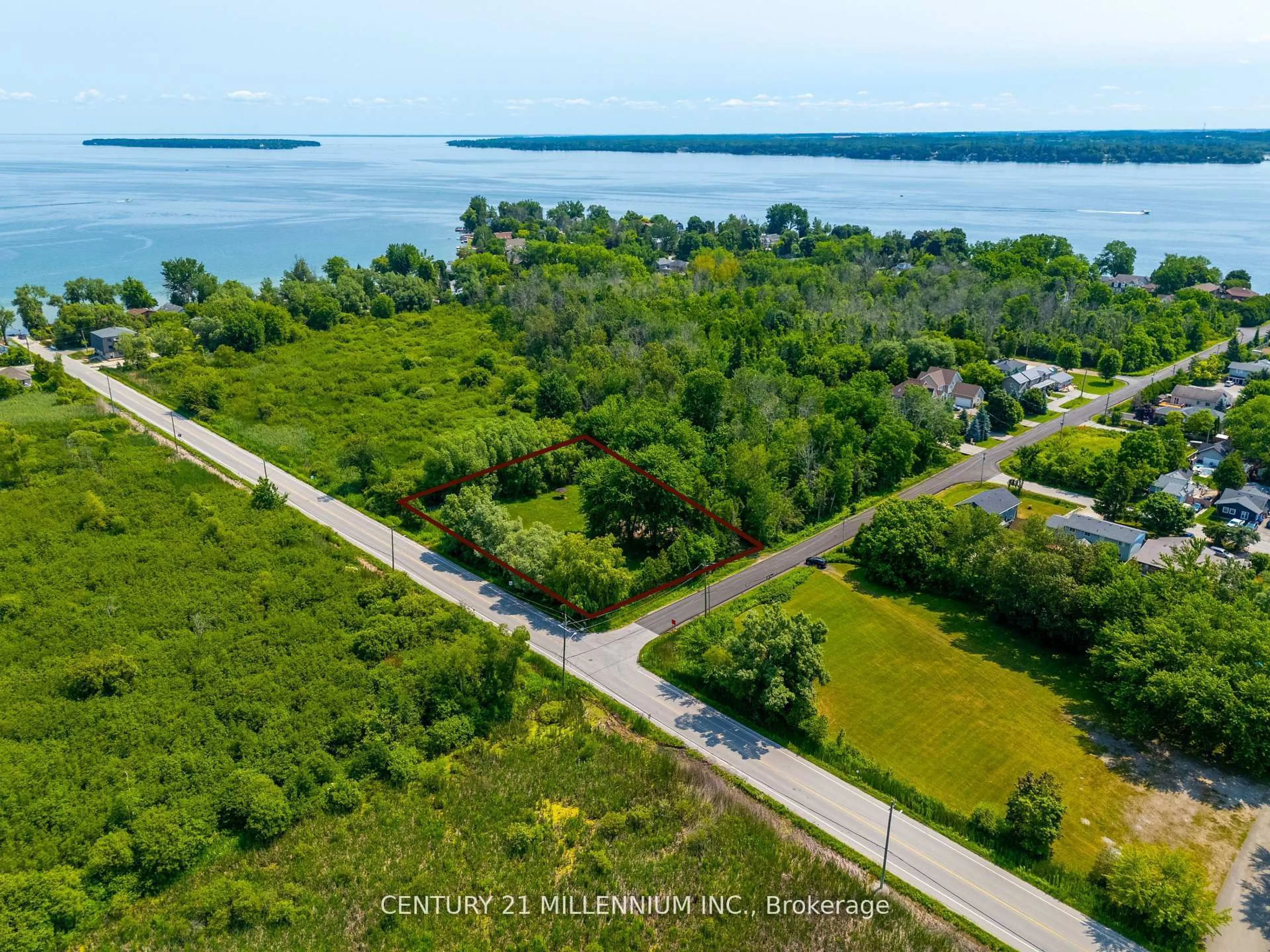 A pic from outside/outdoor area/front of a property/back of a property/a pic from drone, water/lake/river/ocean view for 1027 Chapman St, Innisfil Ontario L0L 1W0