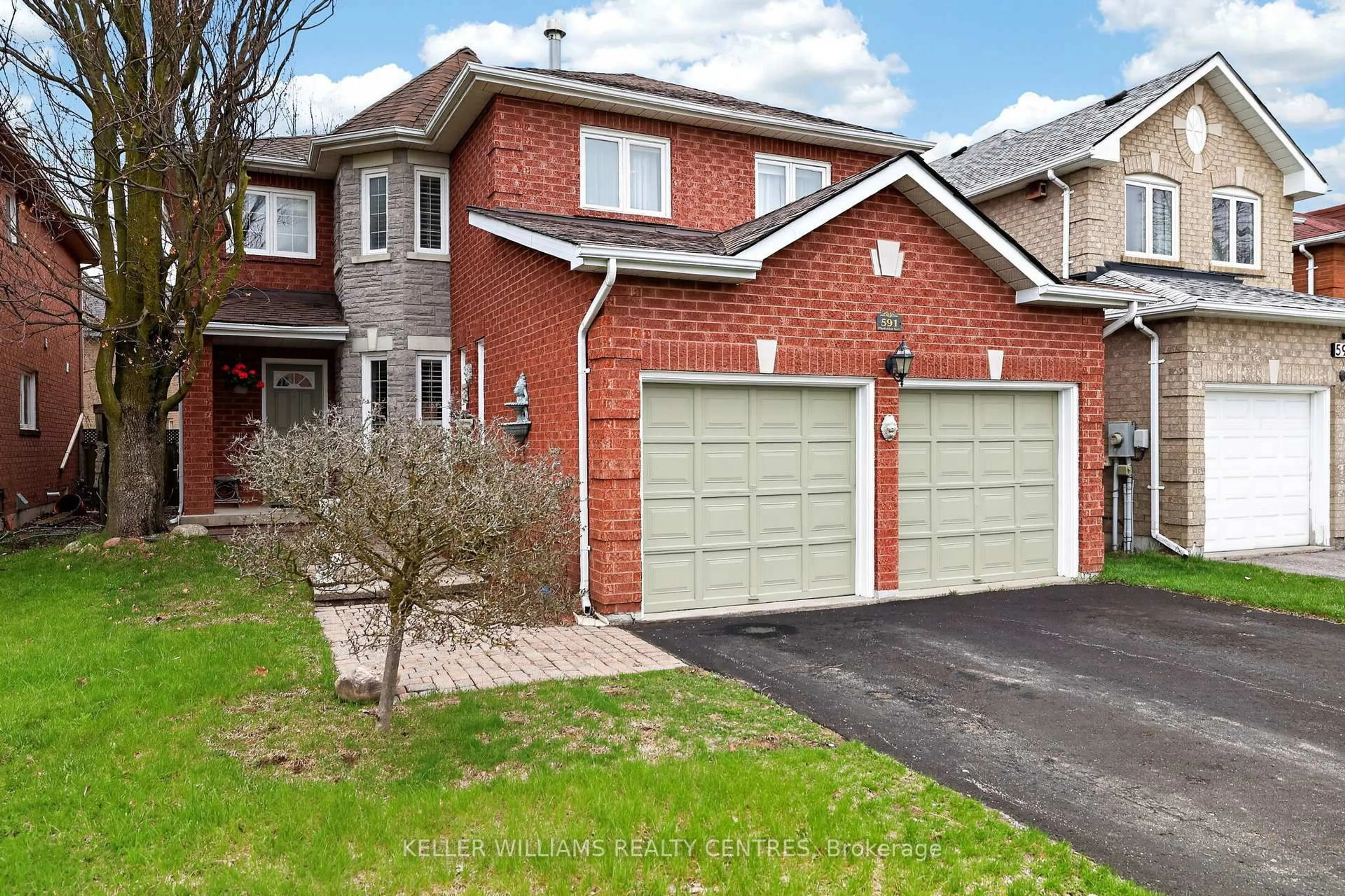 Home with brick exterior material, street for 591 Plantation Gate, Newmarket Ontario L3X 2C2