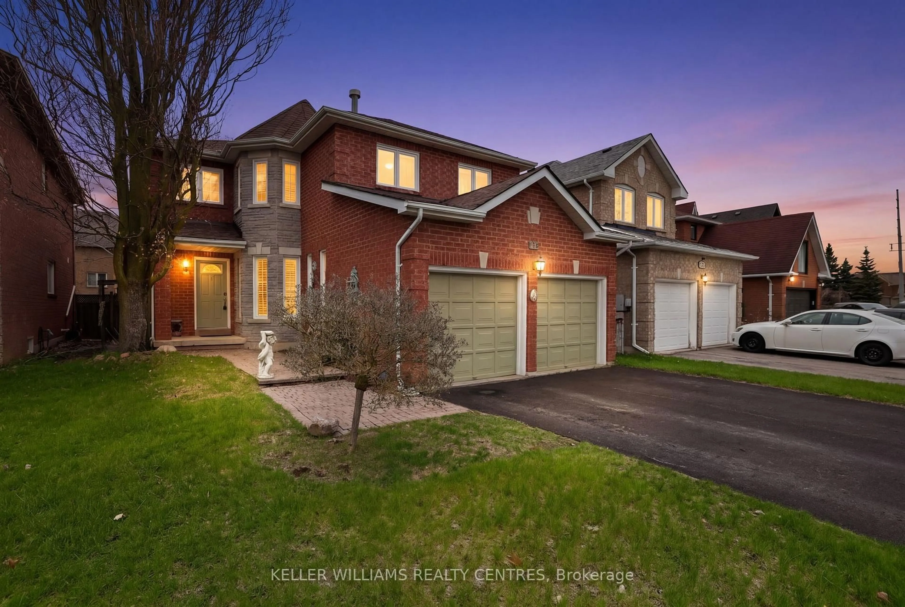 Home with brick exterior material, street for 591 Plantation Gate, Newmarket Ontario L3X 2C2