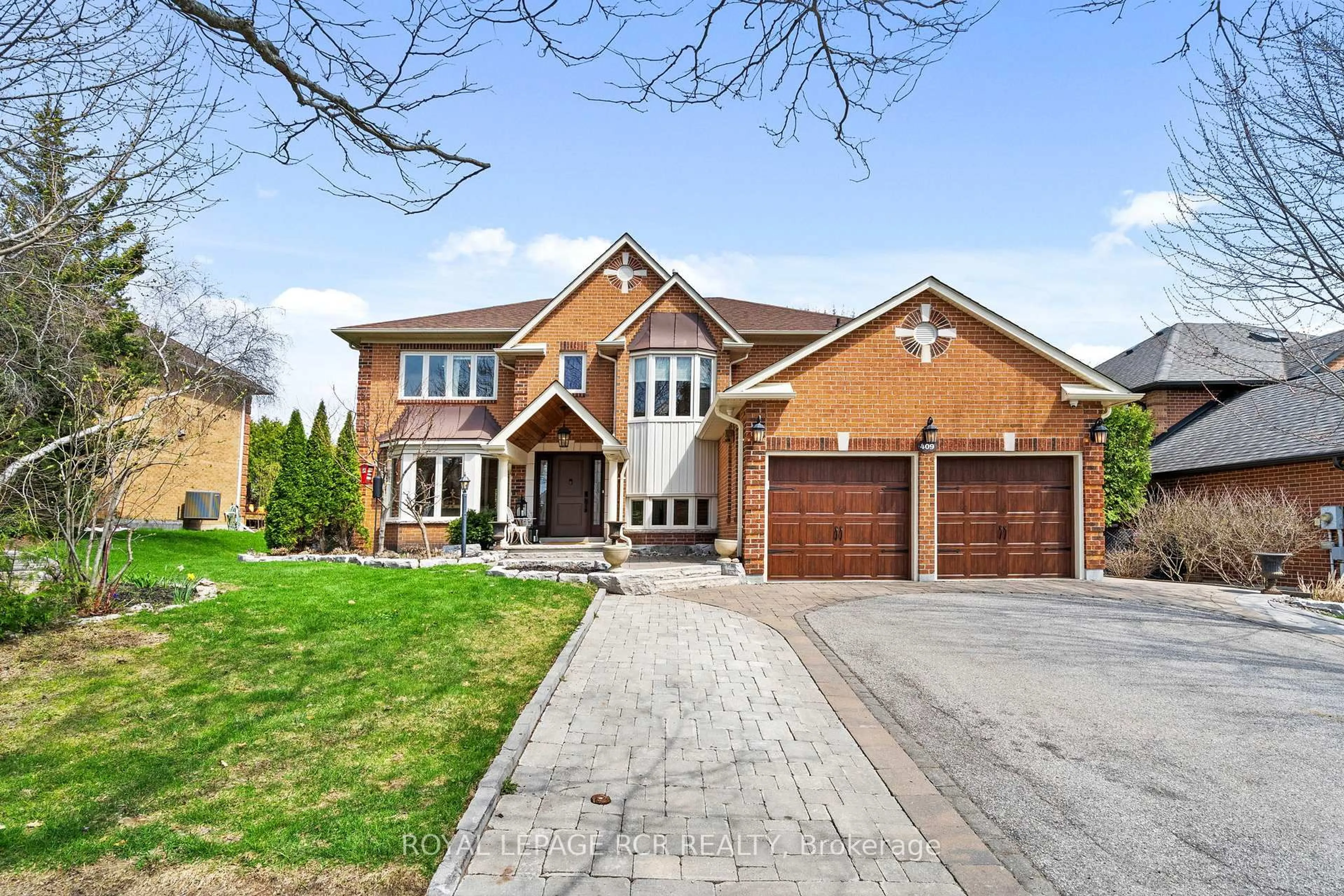 Home with brick exterior material, street for 409 Alex Doner Dr, Newmarket Ontario L3X 1C6