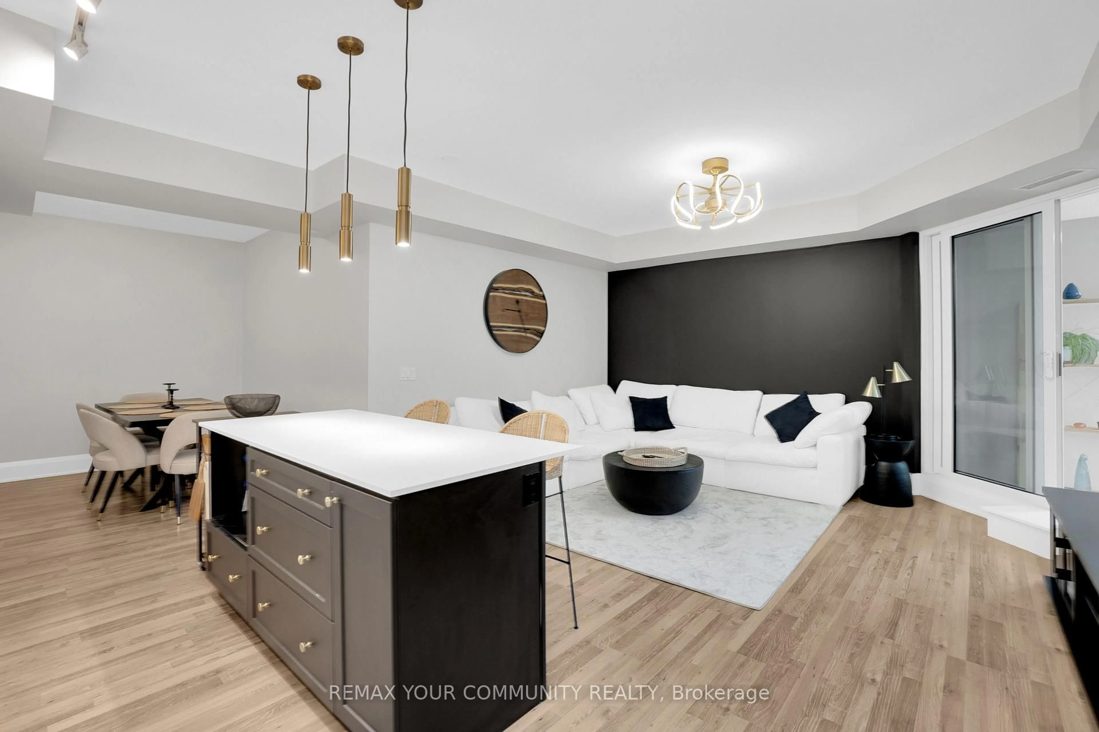 Open concept kitchen, wood/laminate floor for 9085 Jane St #523, Vaughan Ontario L4E 0L8