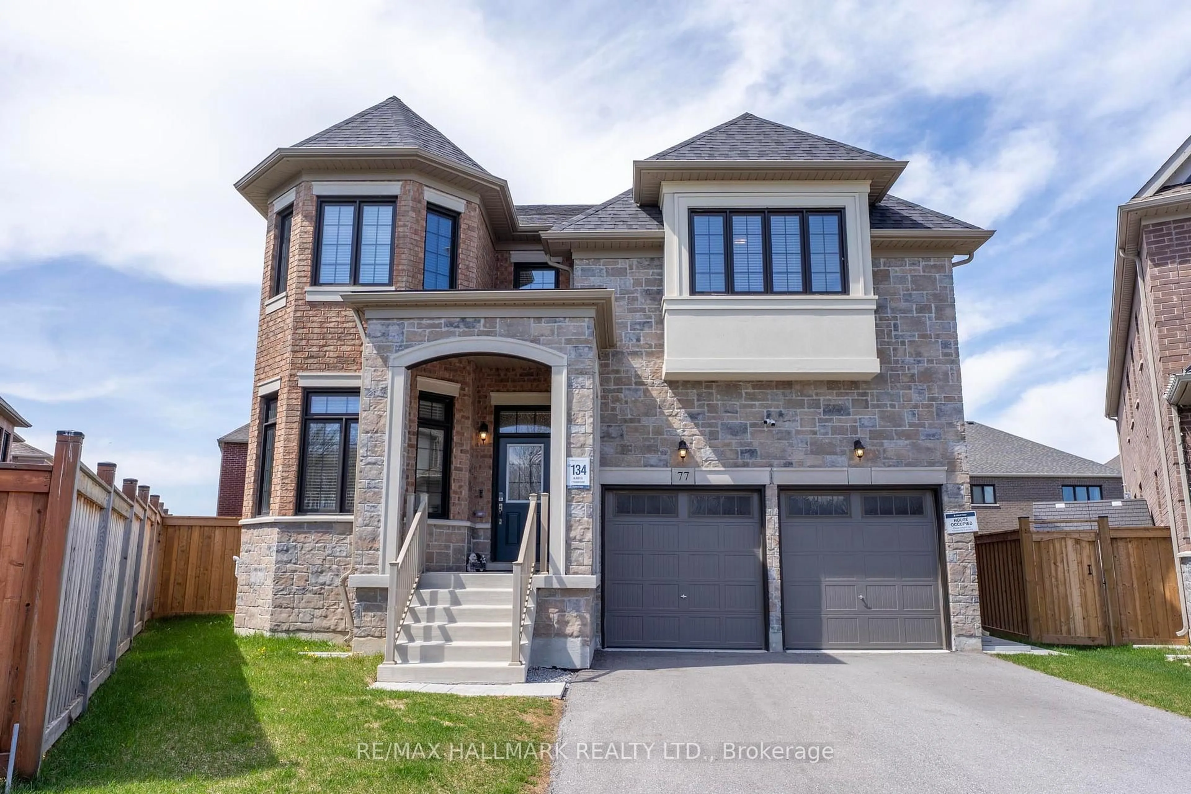 Home with brick exterior material, street for 77 Terrain Crt, East Gwillimbury Ontario L9N 0T2
