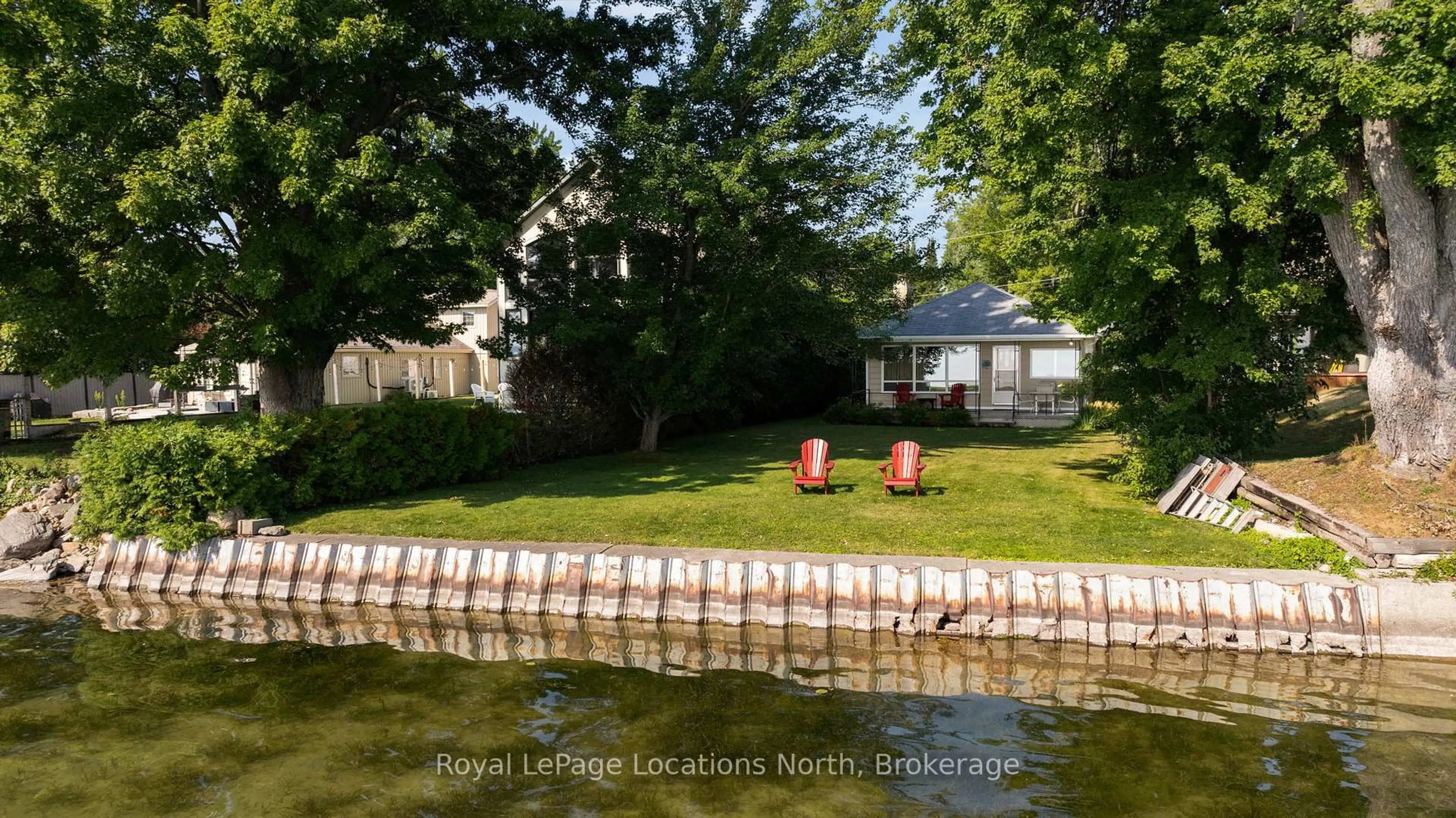A pic from outside/outdoor area/front of a property/back of a property/a pic from drone, water/lake/river/ocean view for 297 Beach Rd, Innisfil Ontario L0L 1R0