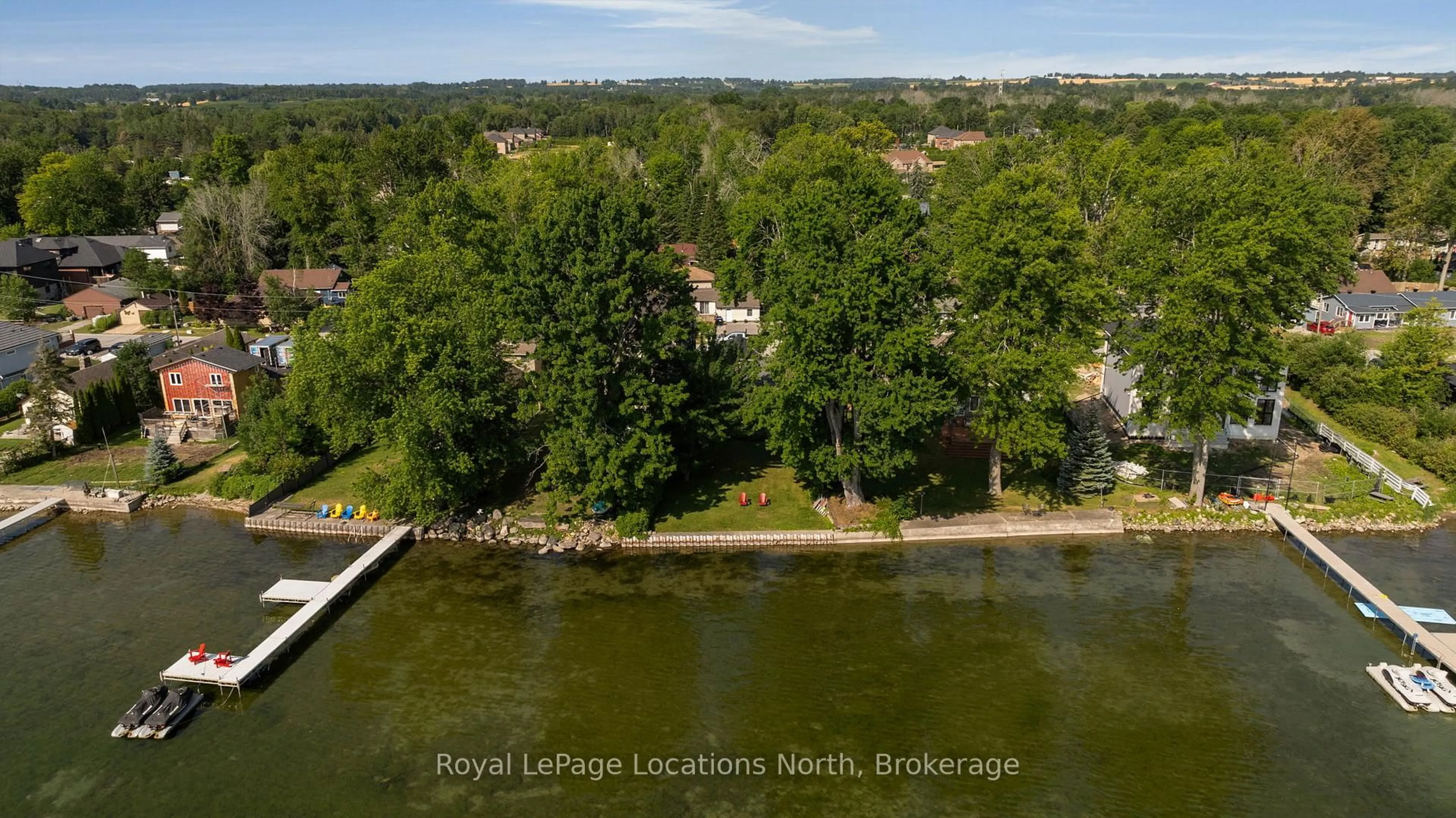 A pic from outside/outdoor area/front of a property/back of a property/a pic from drone, water/lake/river/ocean view for 297 Beach Rd, Innisfil Ontario L0L 1R0