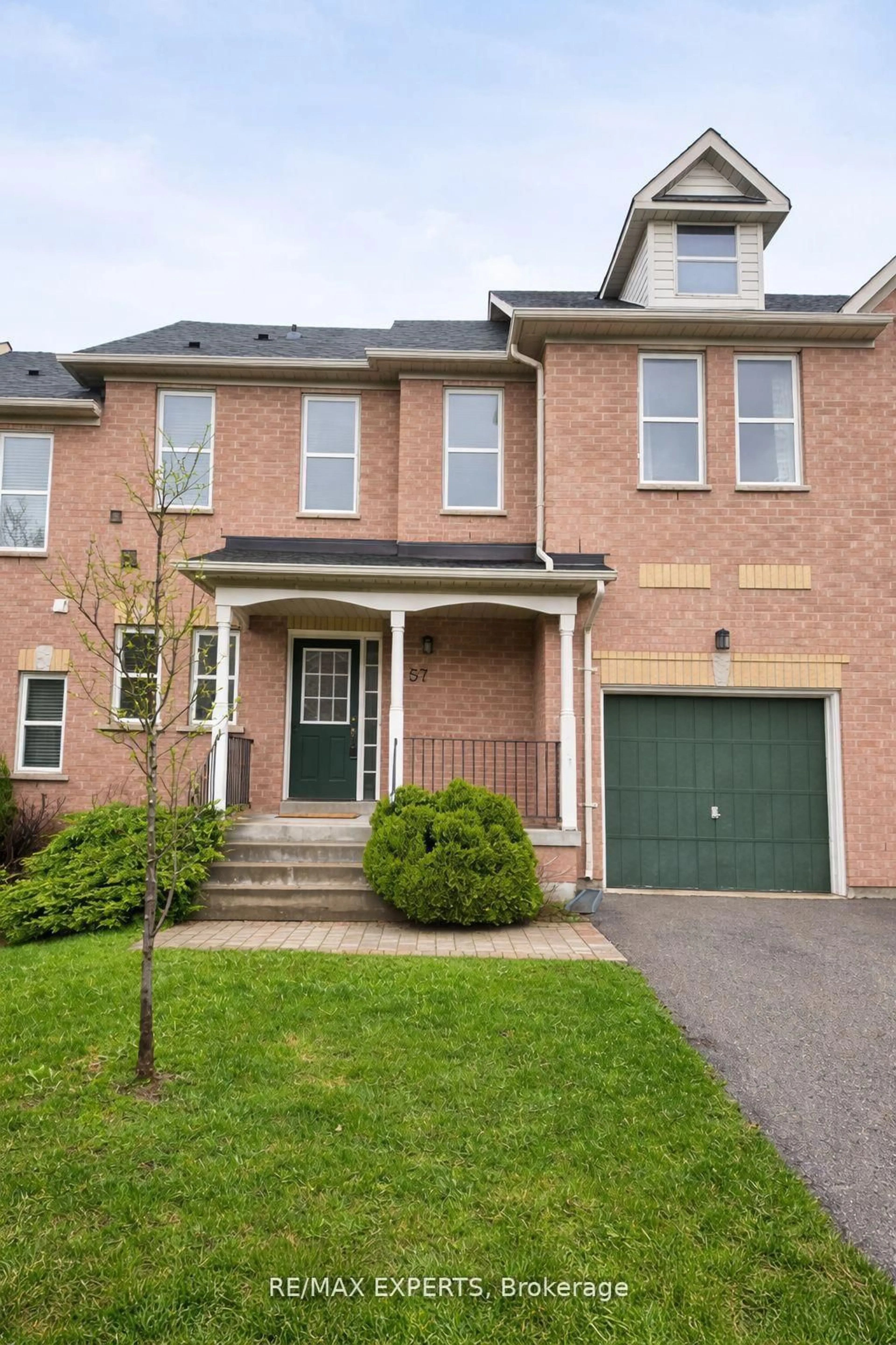 Home with brick exterior material, street for 57 Drew Kelly Way #7, Markham Ontario L3R 5R2