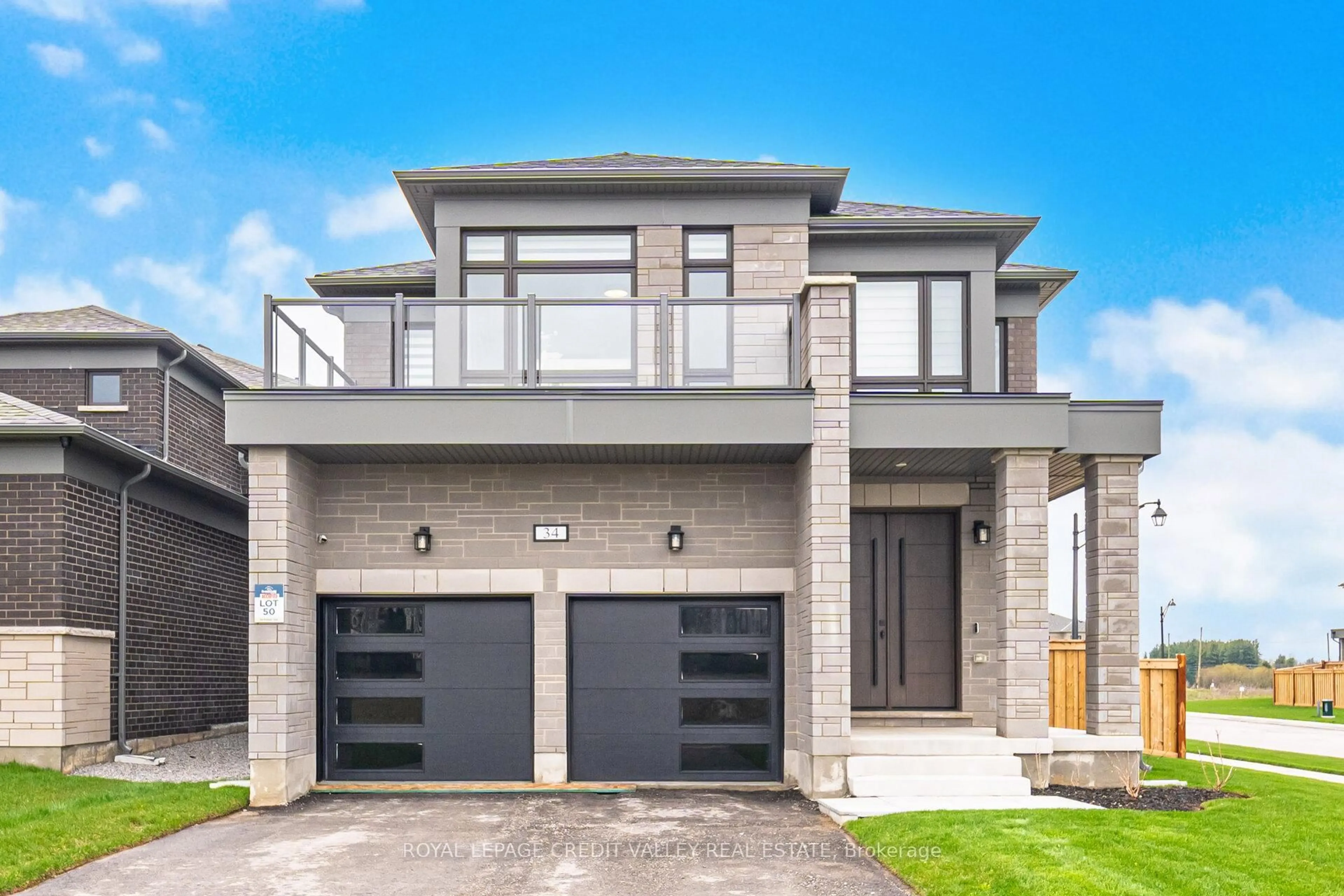 Home with brick exterior material, street for 34 Felhazi Tr, Essa Ontario L3N 0A4