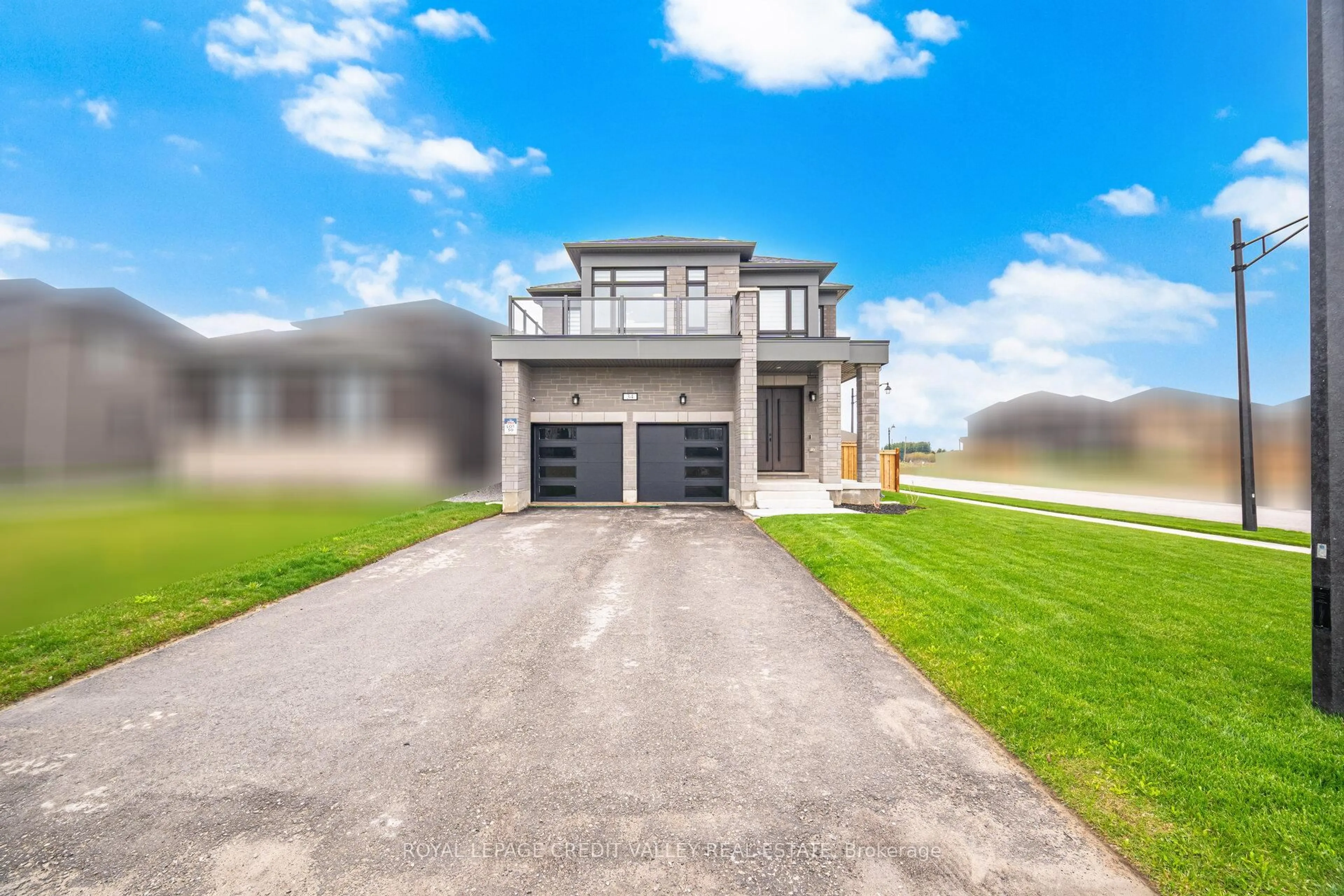 A pic from outside/outdoor area/front of a property/back of a property/a pic from drone, unknown for 34 Felhazi Tr, Essa Ontario L3N 0A4