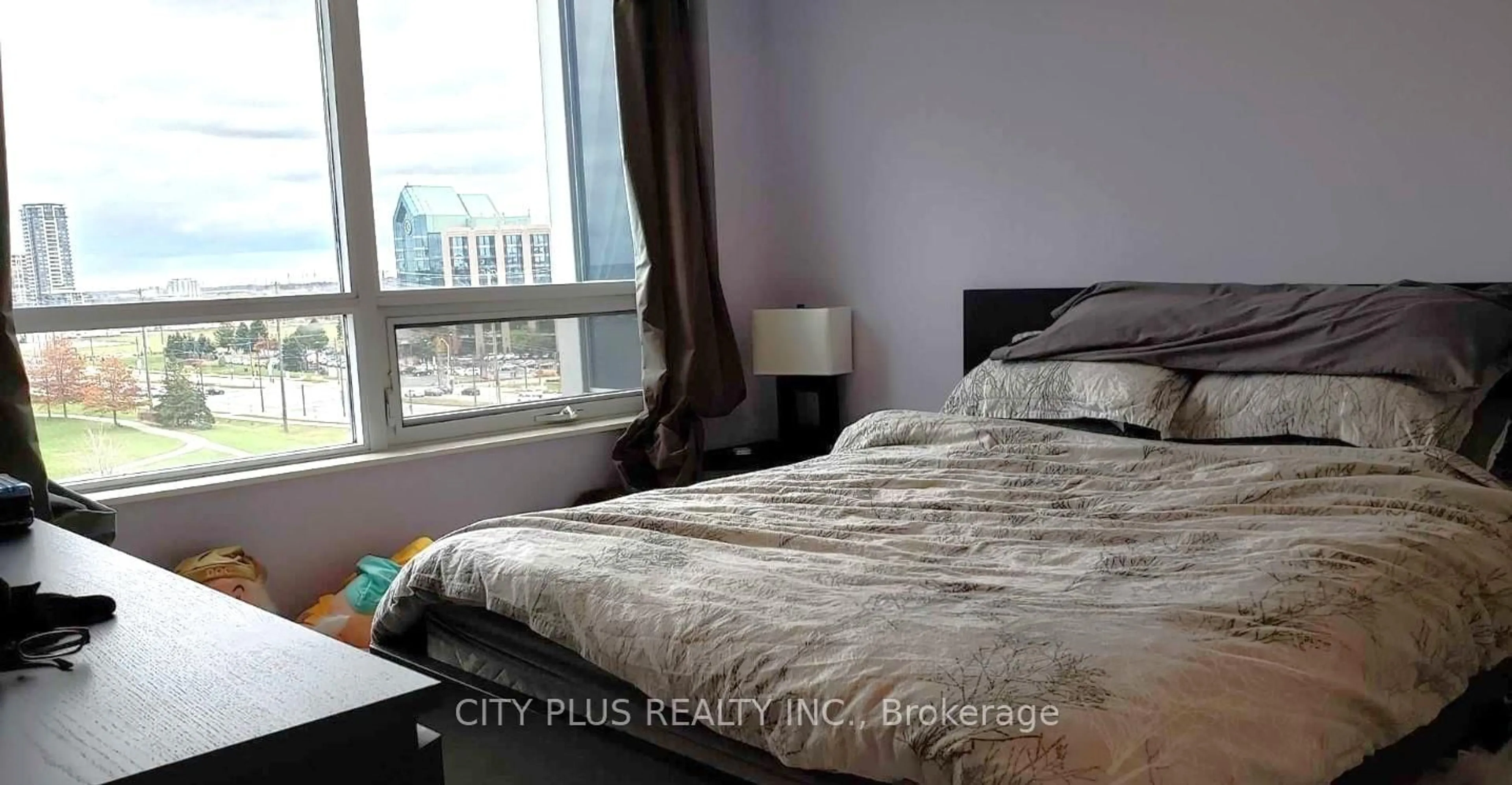 Bedroom with bed, wood/laminate floor for 33 Cox Blvd #823, Markham Ontario L3R 8A6