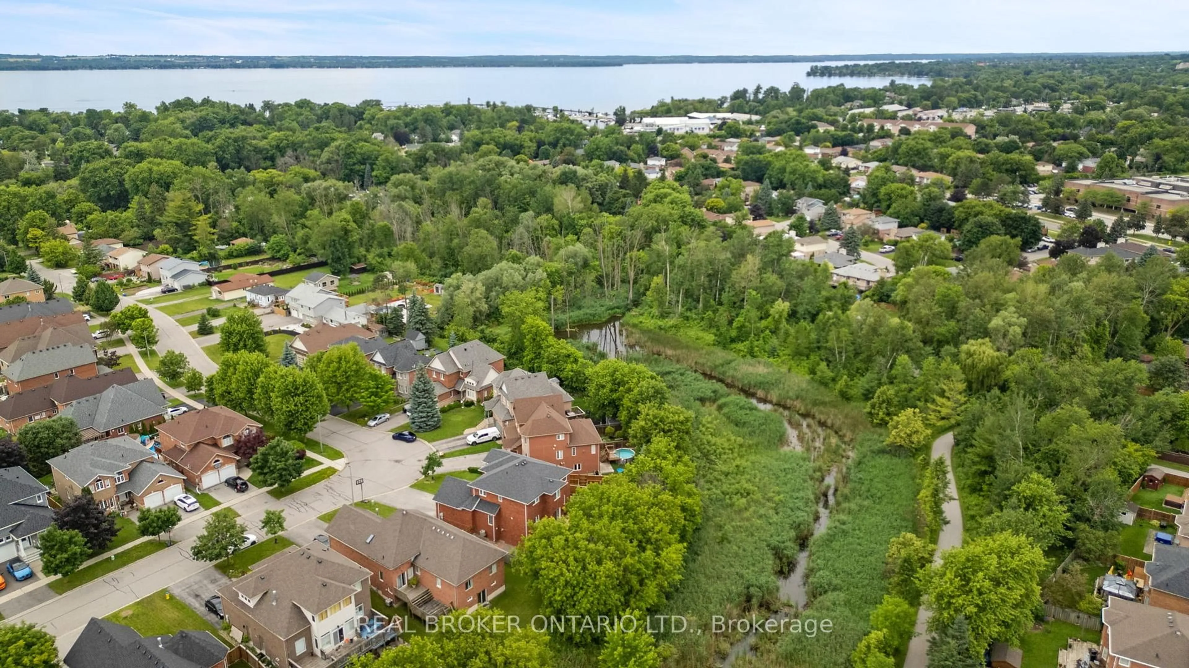 A pic from outside/outdoor area/front of a property/back of a property/a pic from drone, water/lake/river/ocean view for 118 Bayview Ave, Georgina Ontario L4P 2S9