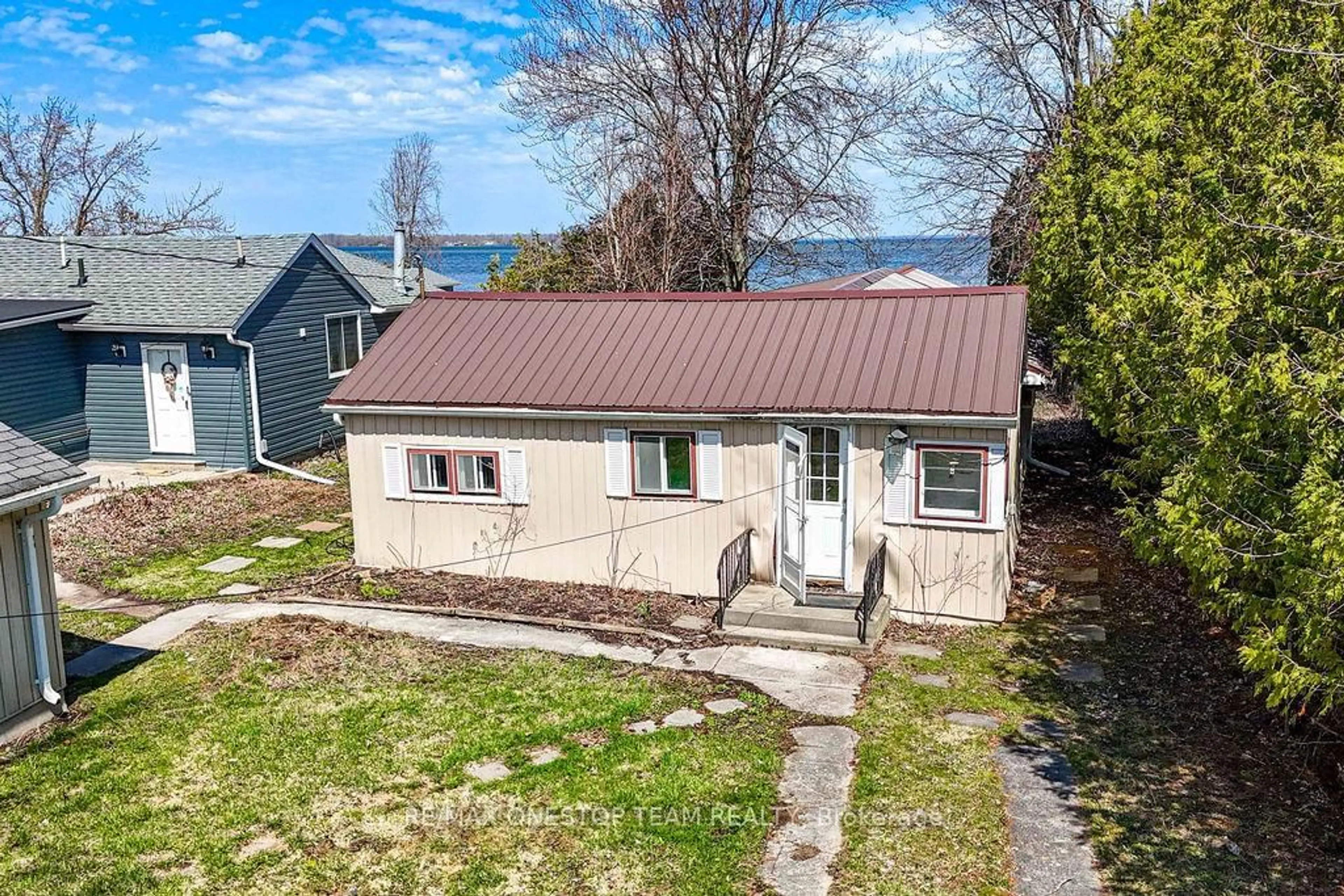 A pic from outside/outdoor area/front of a property/back of a property/a pic from drone, water/lake/river/ocean view for 108 Moore's Beach Rd, Georgina Ontario L0E 1N0