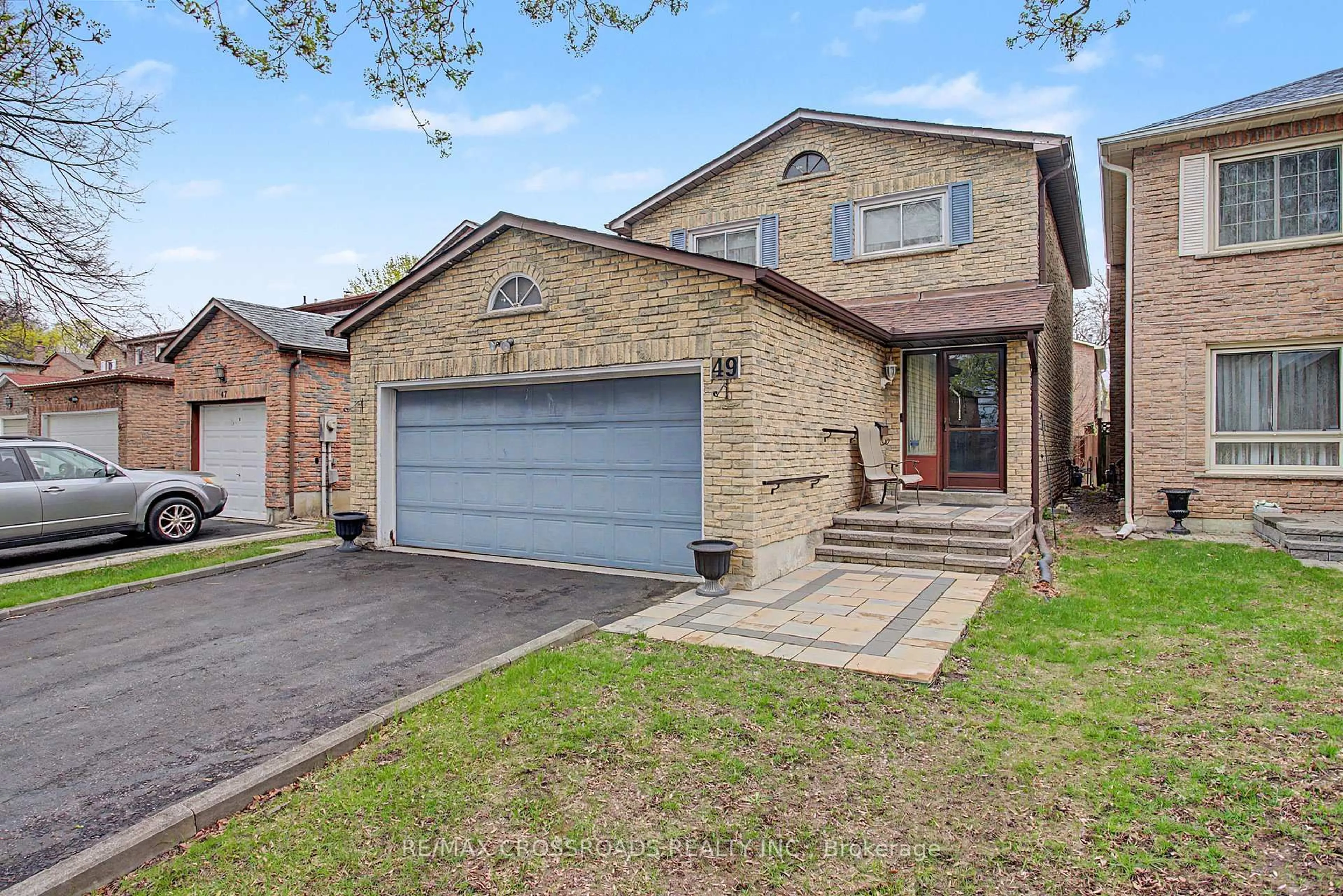 Home with brick exterior material, street for 49 Mercer Cres, Markham Ontario L3P 4K2