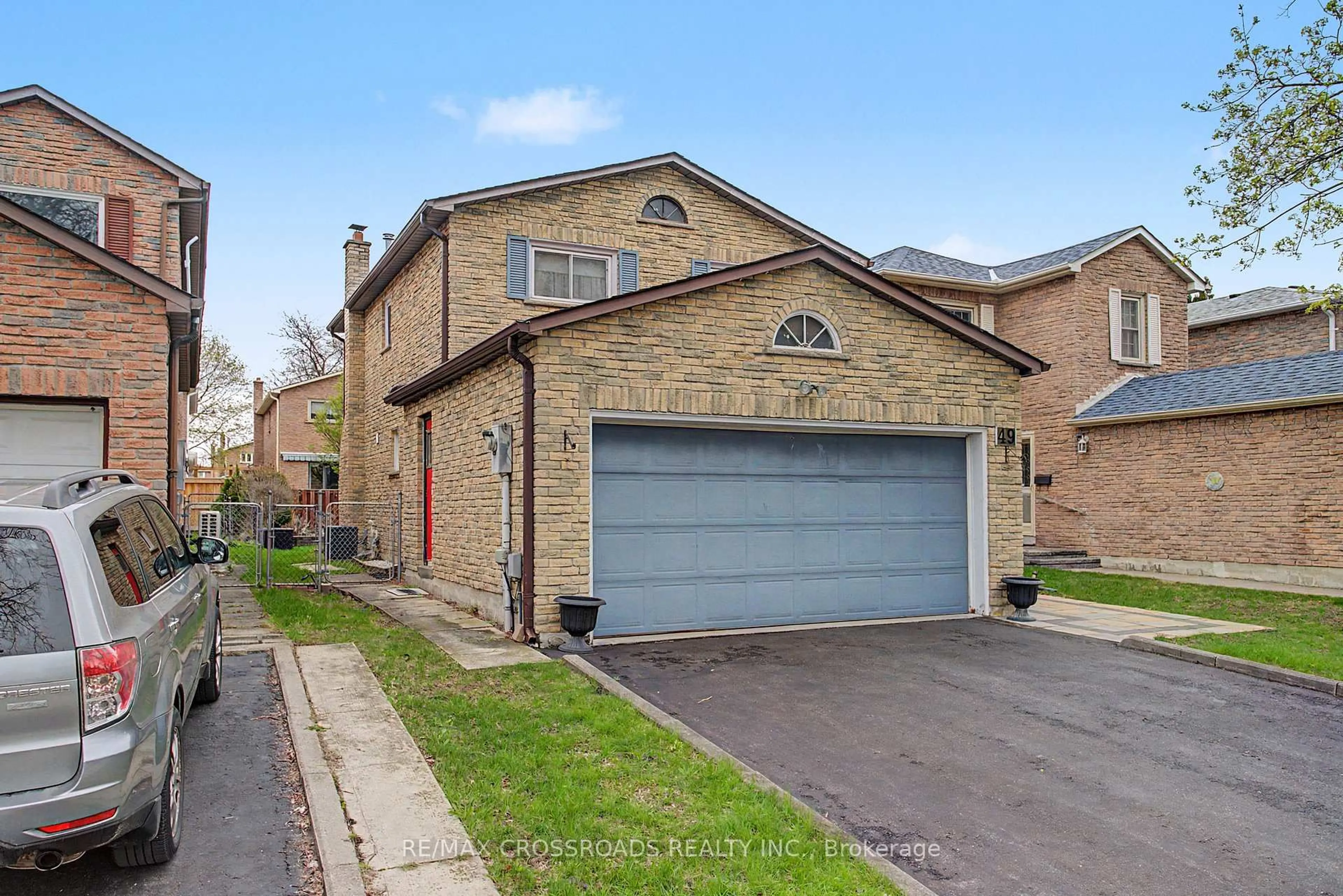 Home with brick exterior material, street for 49 Mercer Cres, Markham Ontario L3P 4K2