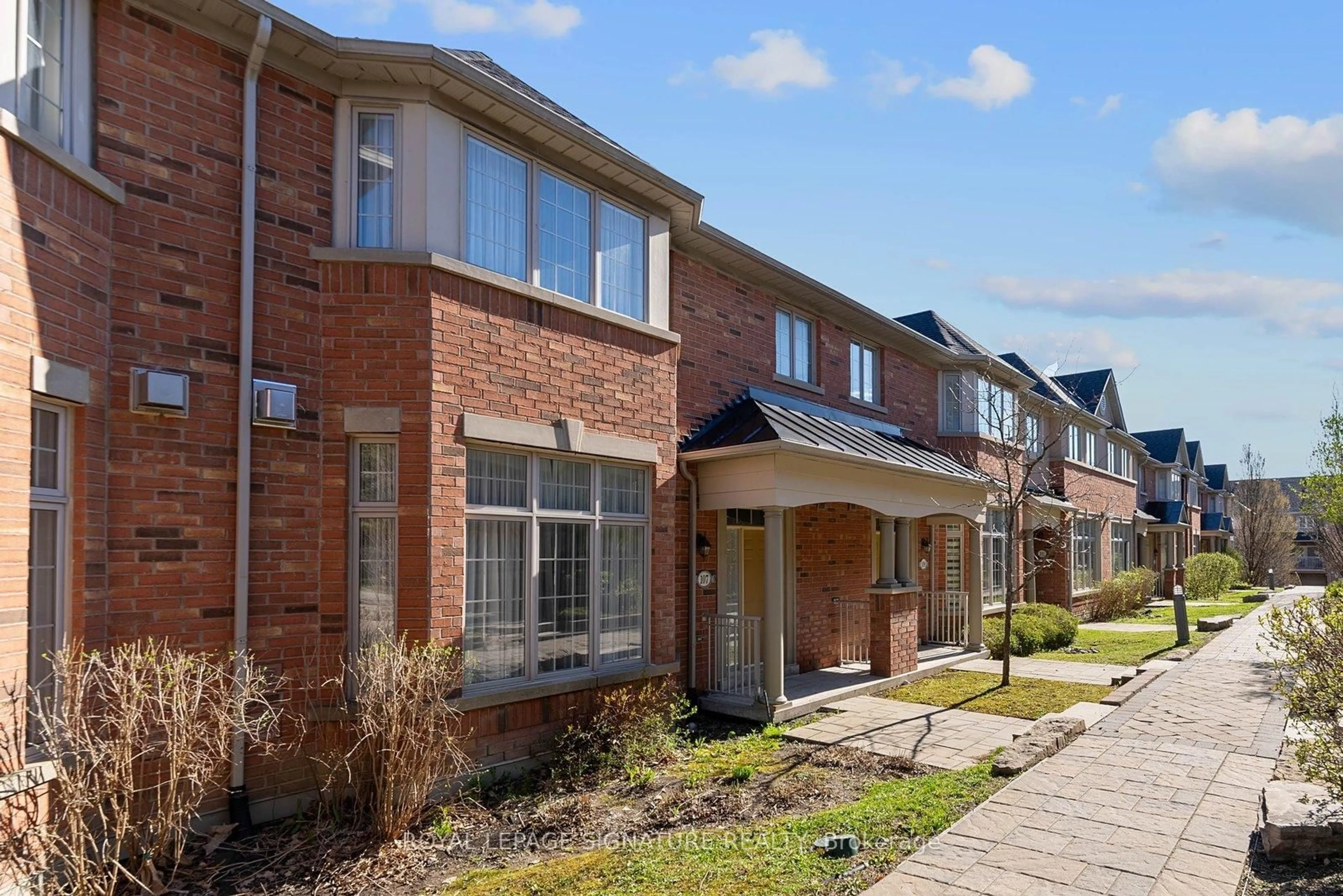 Home with brick exterior material, street for 107 Legends Way, Markham Ontario L3R 6A6