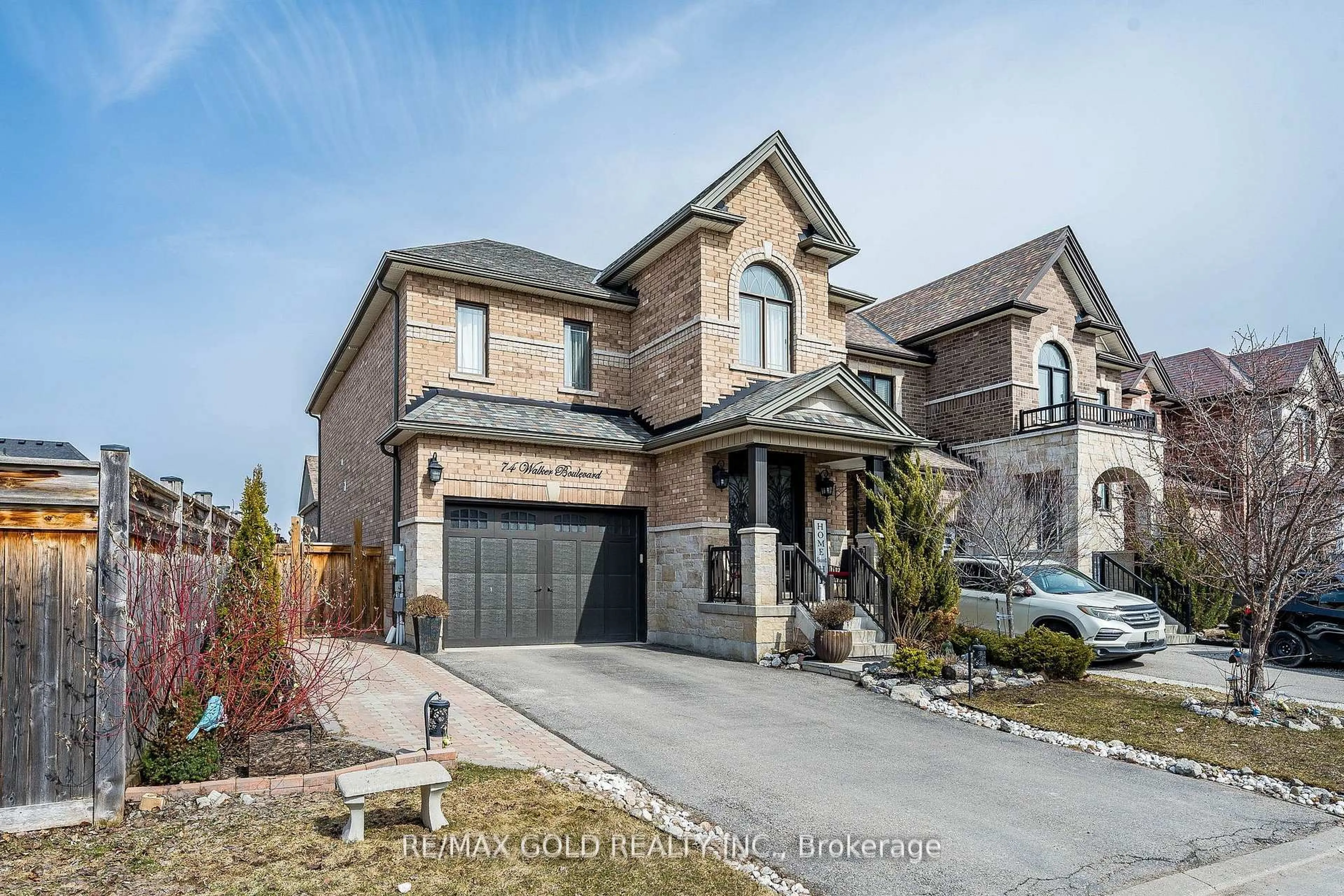 Home with brick exterior material, street for 74 Walker Blvd, New Tecumseth Ontario L9R 0N3