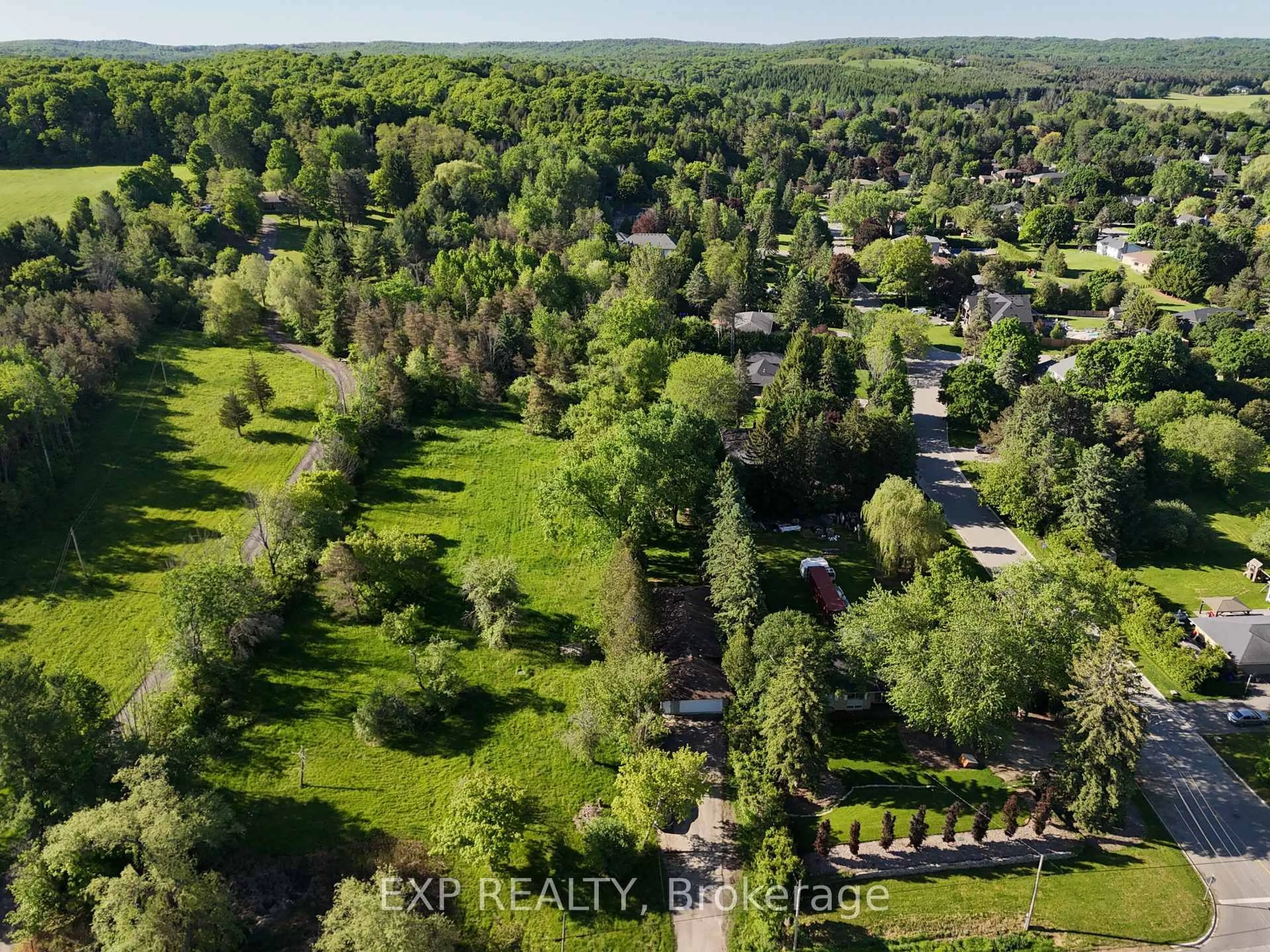 A pic from outside/outdoor area/front of a property/back of a property/a pic from drone, forest/trees view for 4165 Lloydtown-Aurora Rd, King Ontario L7B 0E6