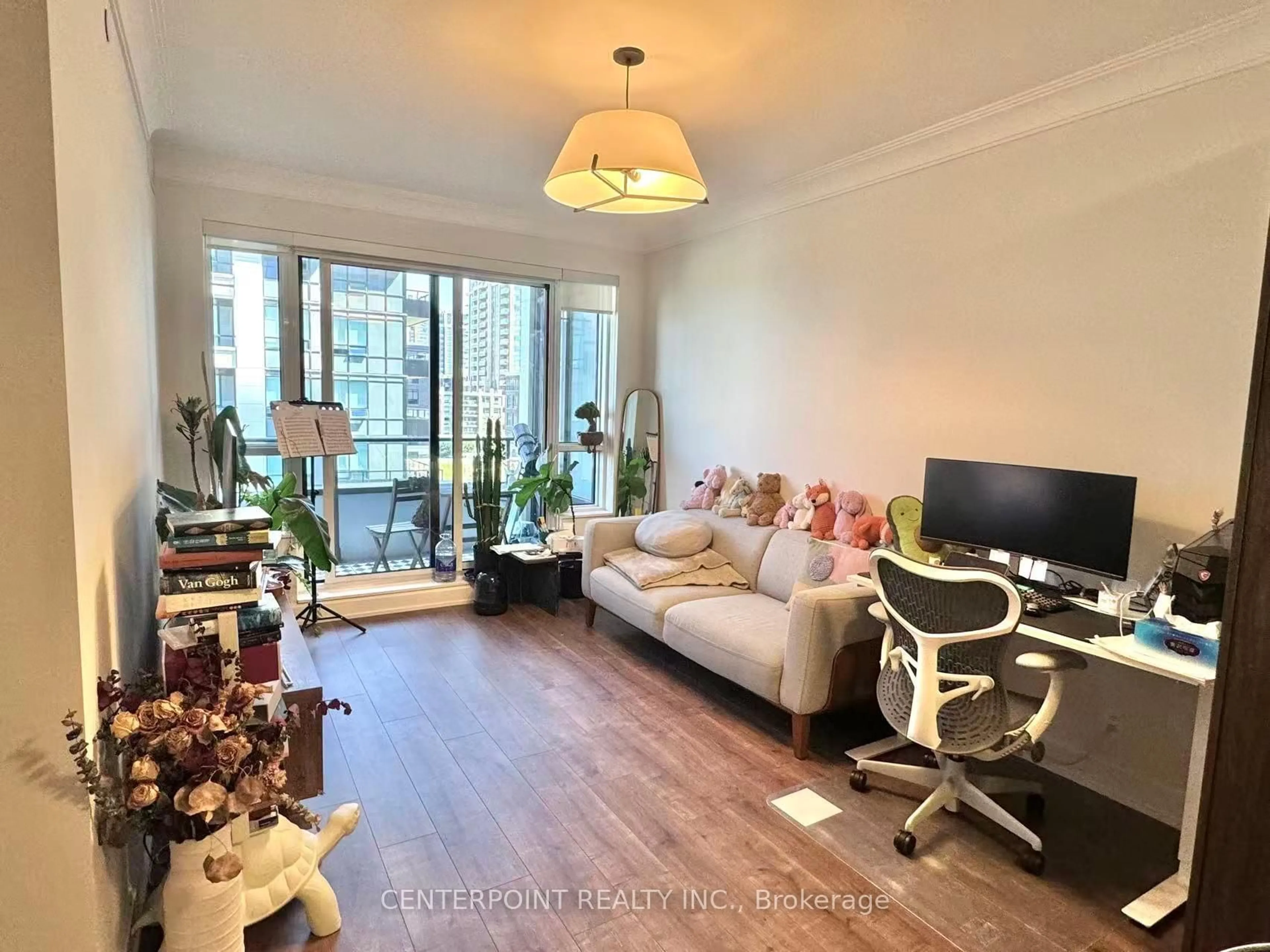 Living room with furniture, wood/laminate floor for 38 Water Walk Dr #619, Markham Ontario L3R 6M8