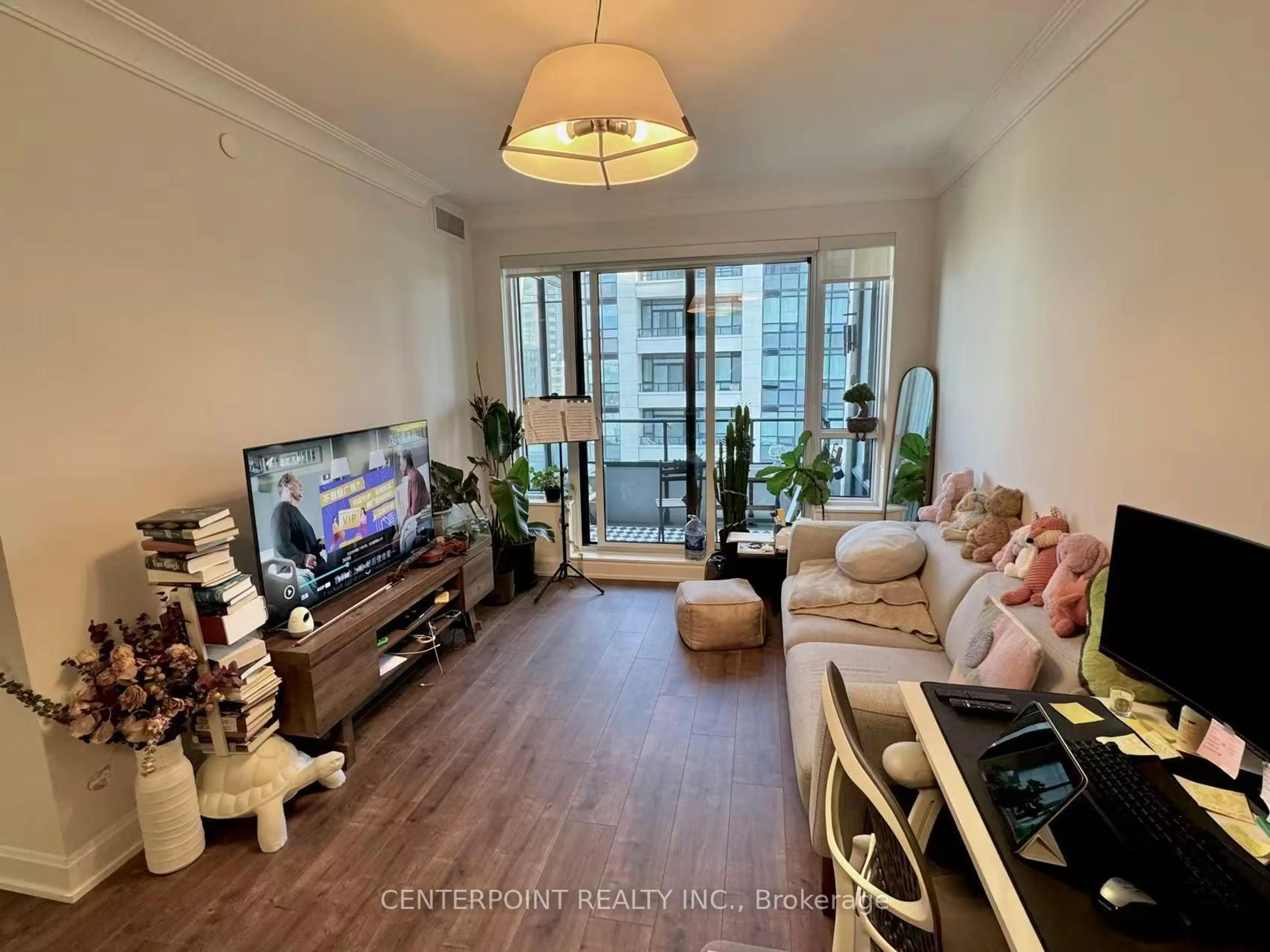 Living room with furniture, wood/laminate floor for 38 Water Walk Dr #619, Markham Ontario L3R 6M8