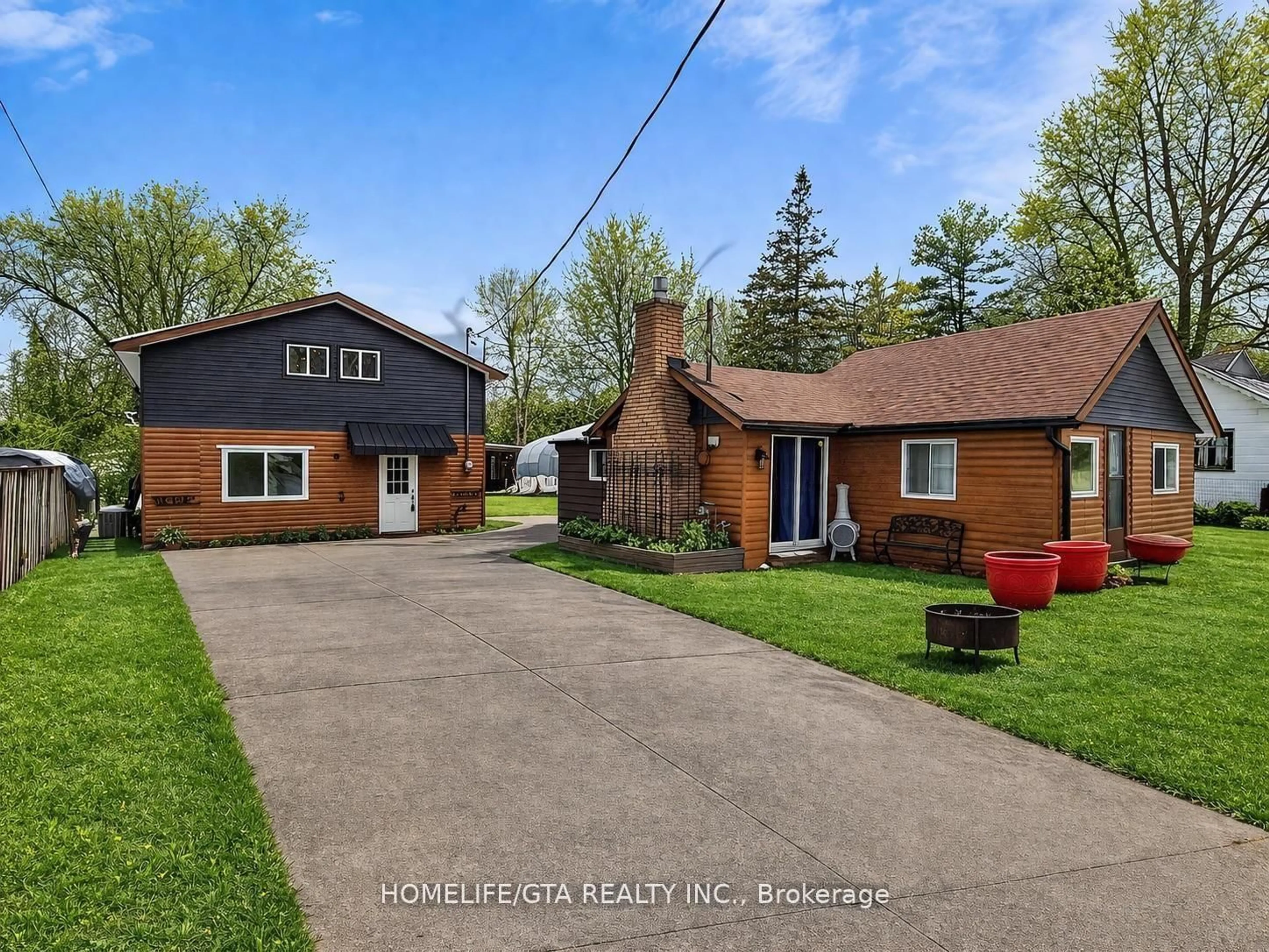 A pic from outside/outdoor area/front of a property/back of a property/a pic from drone, street for 31474 Lakeridge Rd, Georgina Ontario L0E 1N0