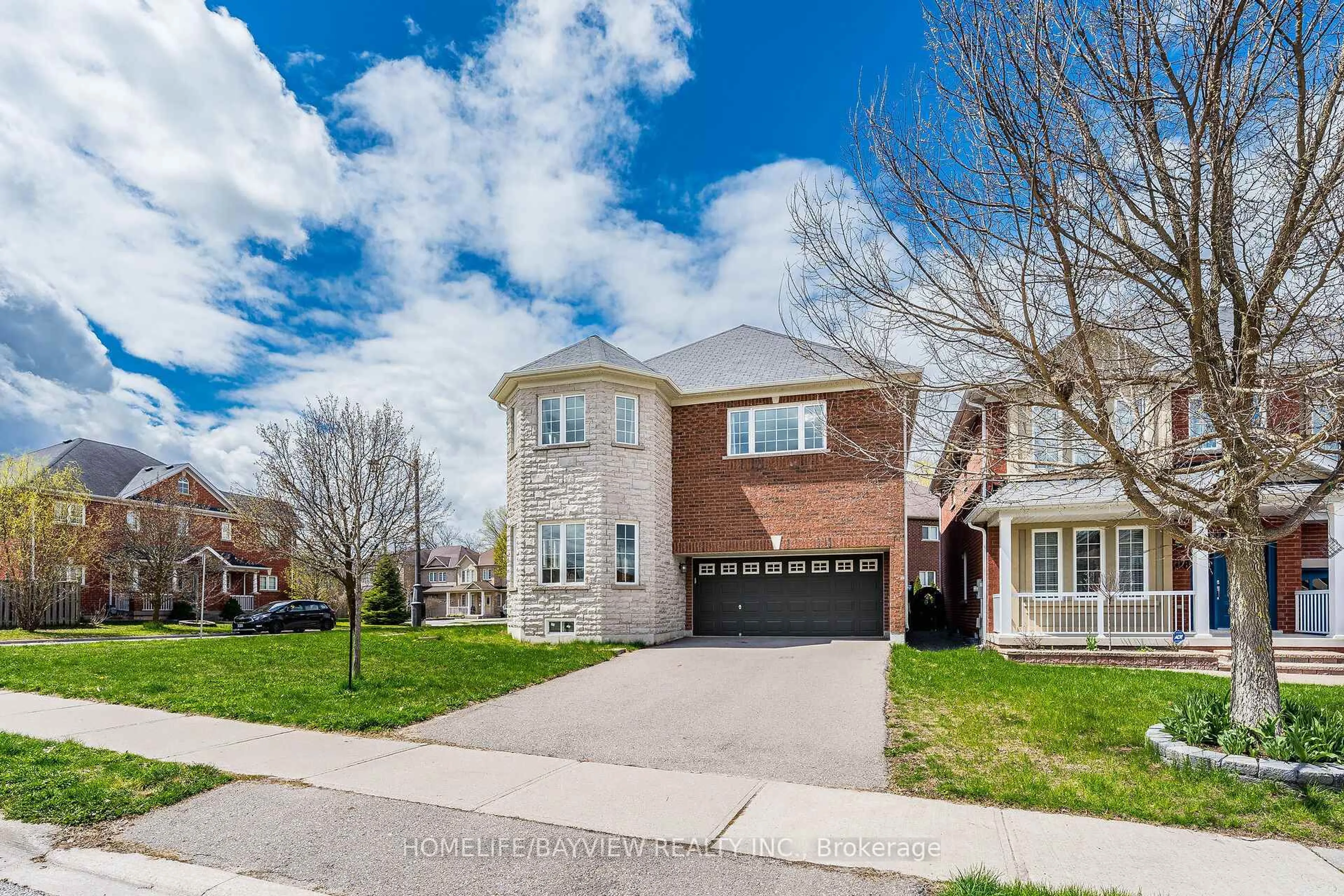 Home with brick exterior material, street for 212 Ray Snow Blvd, Newmarket Ontario L3X 3J3