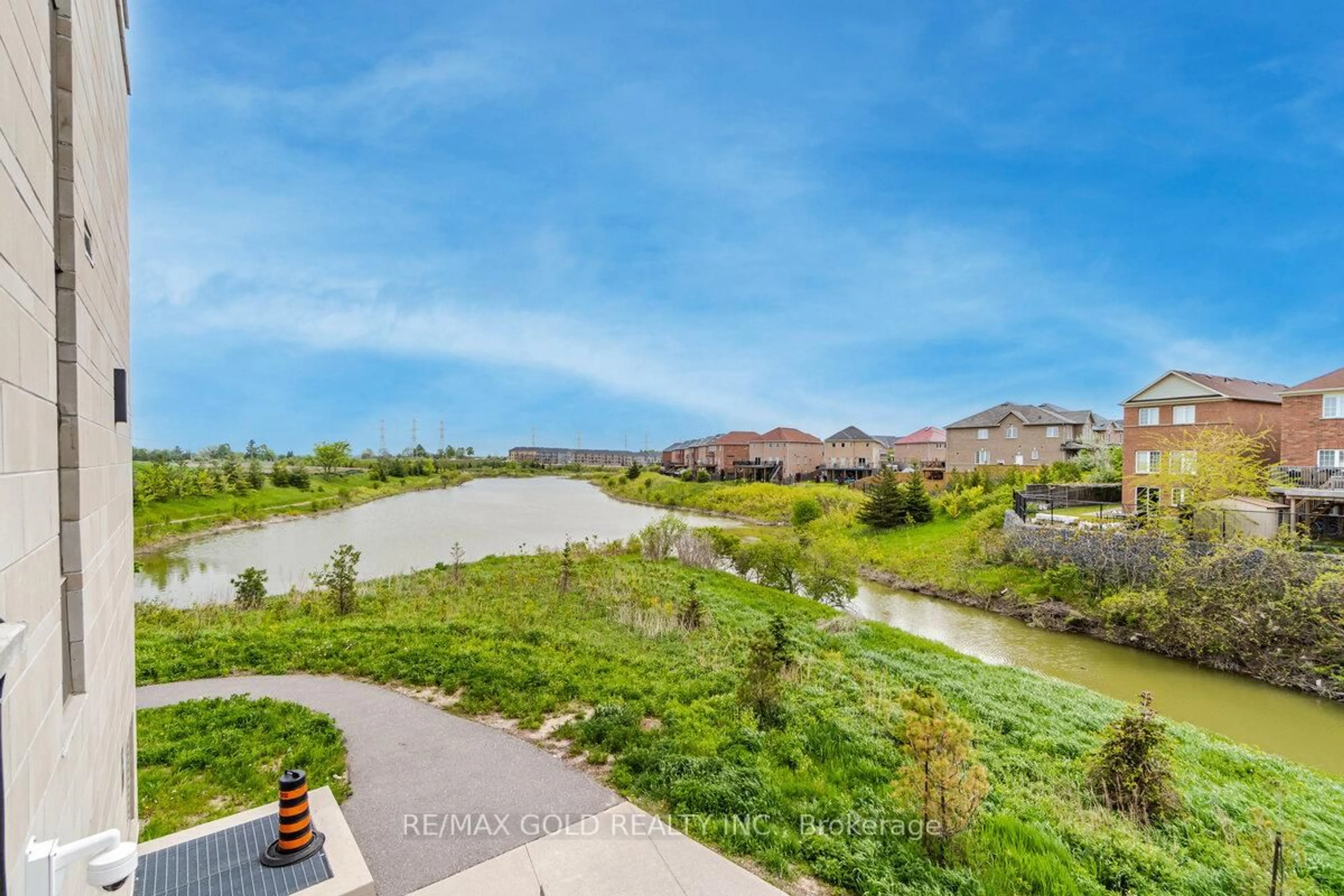 A pic from outside/outdoor area/front of a property/back of a property/a pic from drone, water/lake/river/ocean view for 39 New Delhi Dr #601, Markham Ontario L3S 0E1