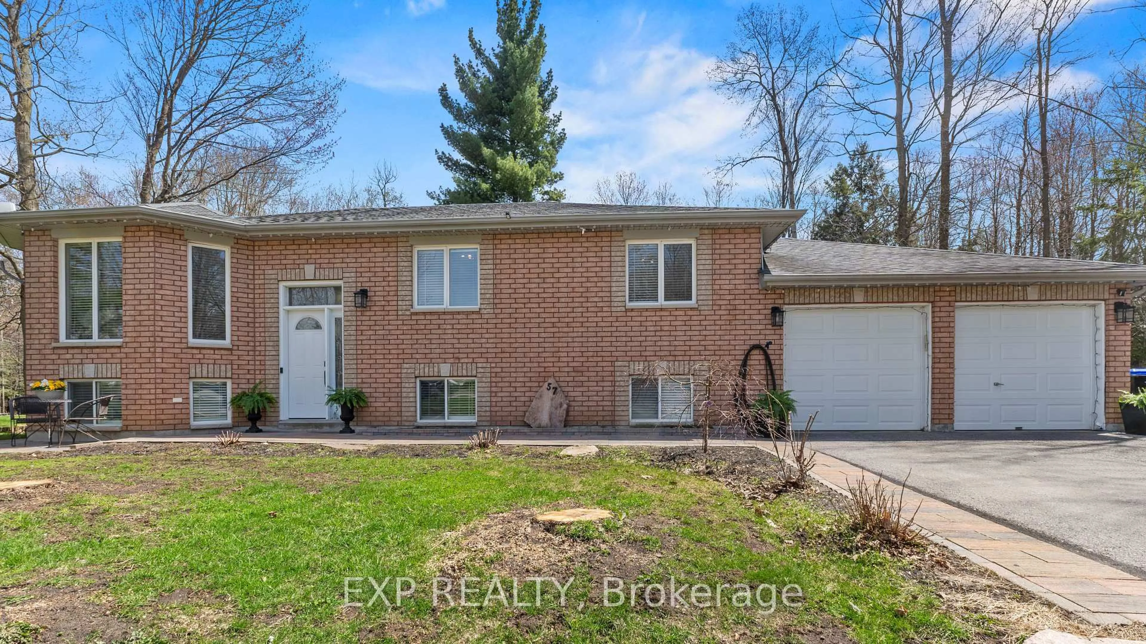 Home with brick exterior material, street for 57 Pine Park Blvd, Adjala-Tosorontio Ontario L0M 1J0