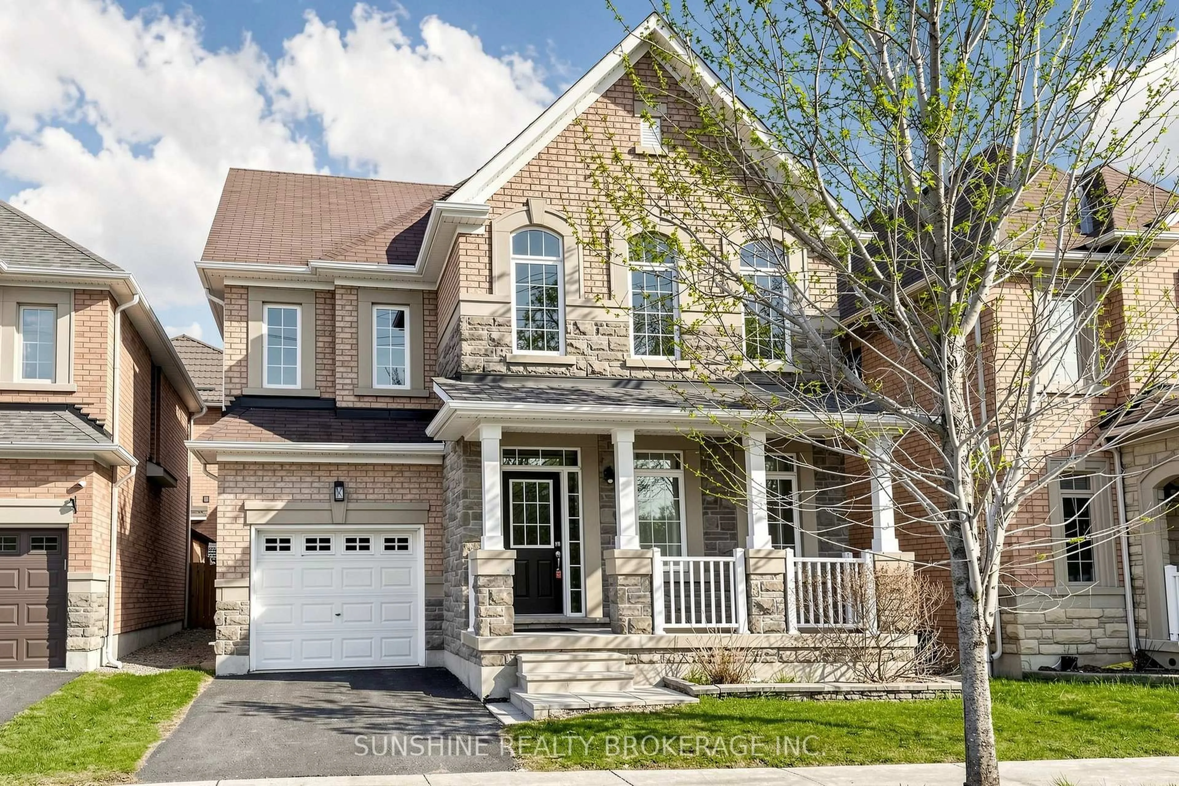 Home with brick exterior material, street for 39 Wozniak Cres, Markham Ontario L6E 0L4